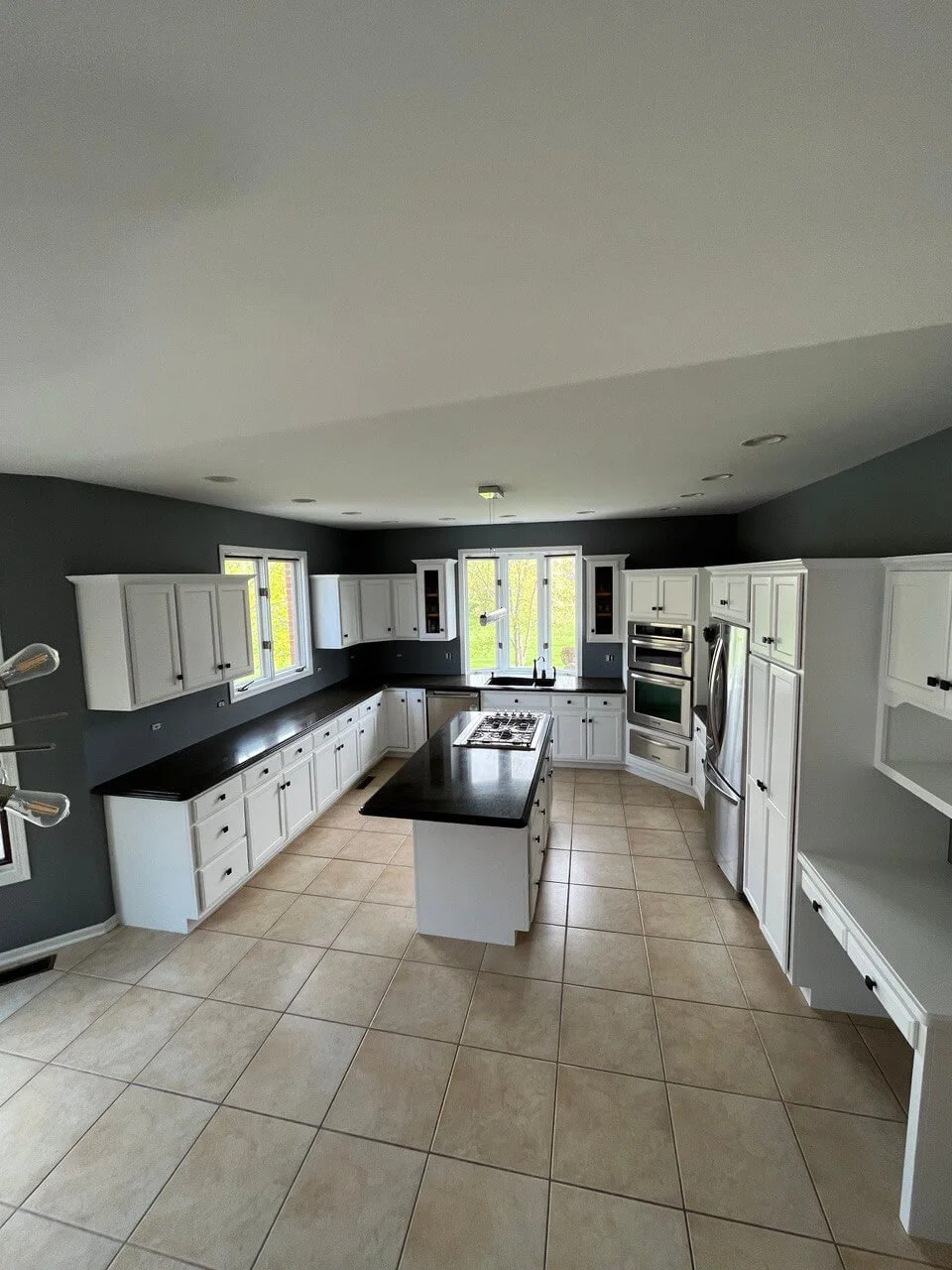 Elegant Kitchen Transformation: Satin White Cabinets and Dark Gray ...