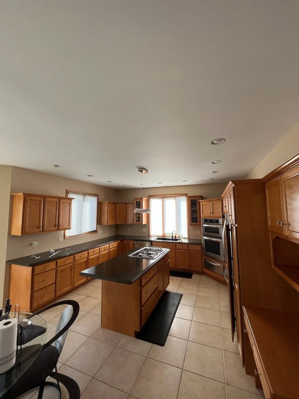 Elegant Kitchen Transformation: Satin White Cabinets and Dark Gray ...