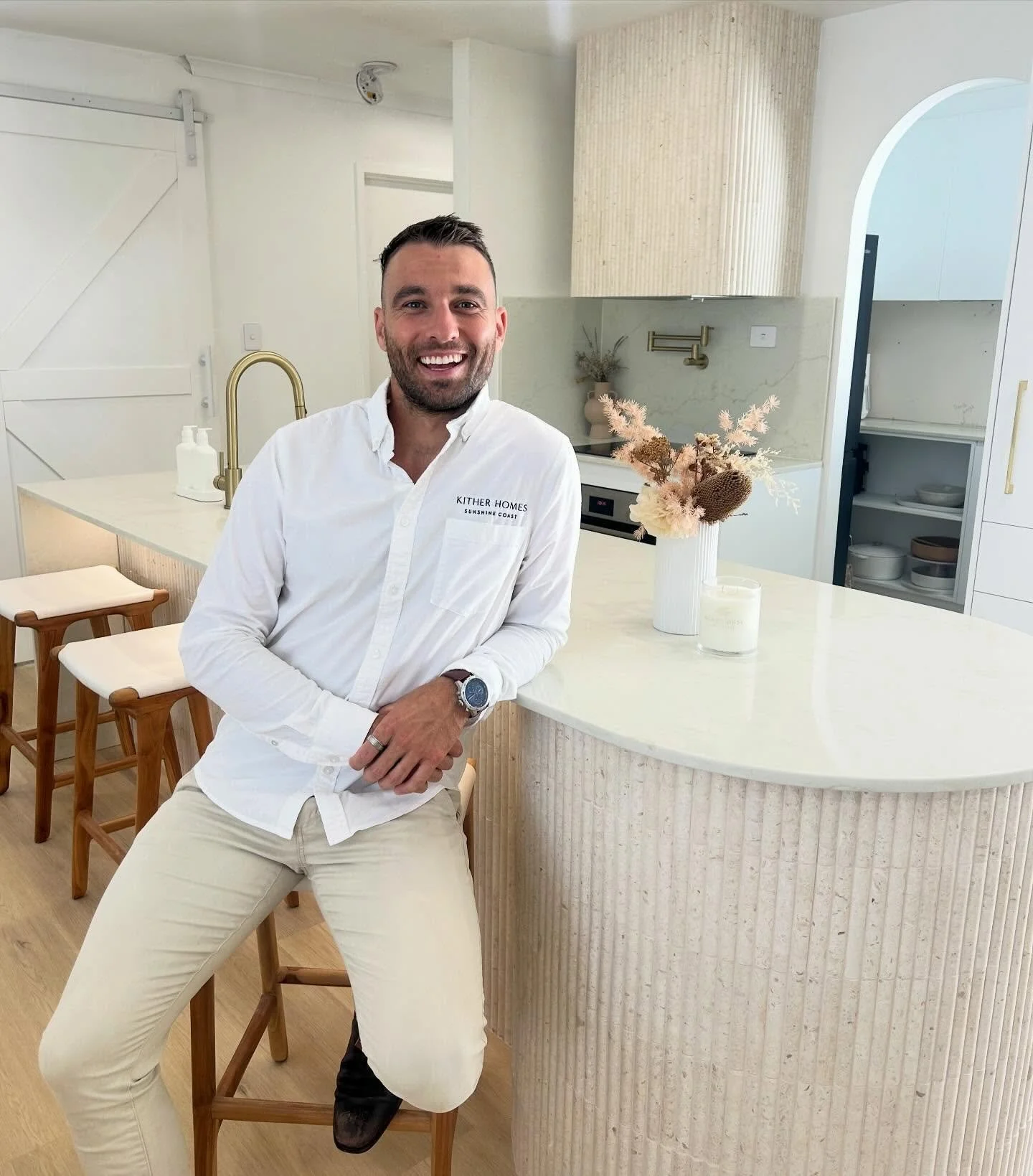 This kitchen was designed to feel calm, timeless, and practical &mdash; a space that works just as well for busy mornings as it does for entertaining.

We specialise in custom renovations and extensions in Noosa, managing the entire process from conc