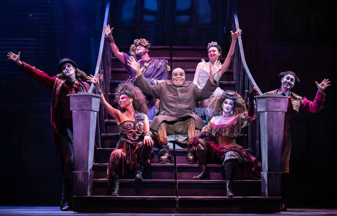 Clive-Rowe-as-Uncle-Fester-centre-with-cast-in-The-Addams-Family-UK-Tour-Credit-Pamela-Raith.jpg