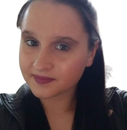 A close-up portrait of a young woman with dark hair, blue eyes, and light skin, wearing makeup including lipstick, and dressed in a dark top or jacket.