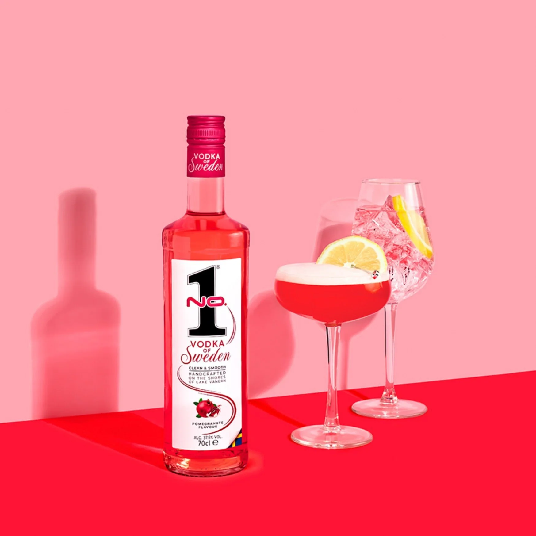No.1 Premium Vodka Pomegranate from Sweden with red cocktails, lemon garnish and ice drinks