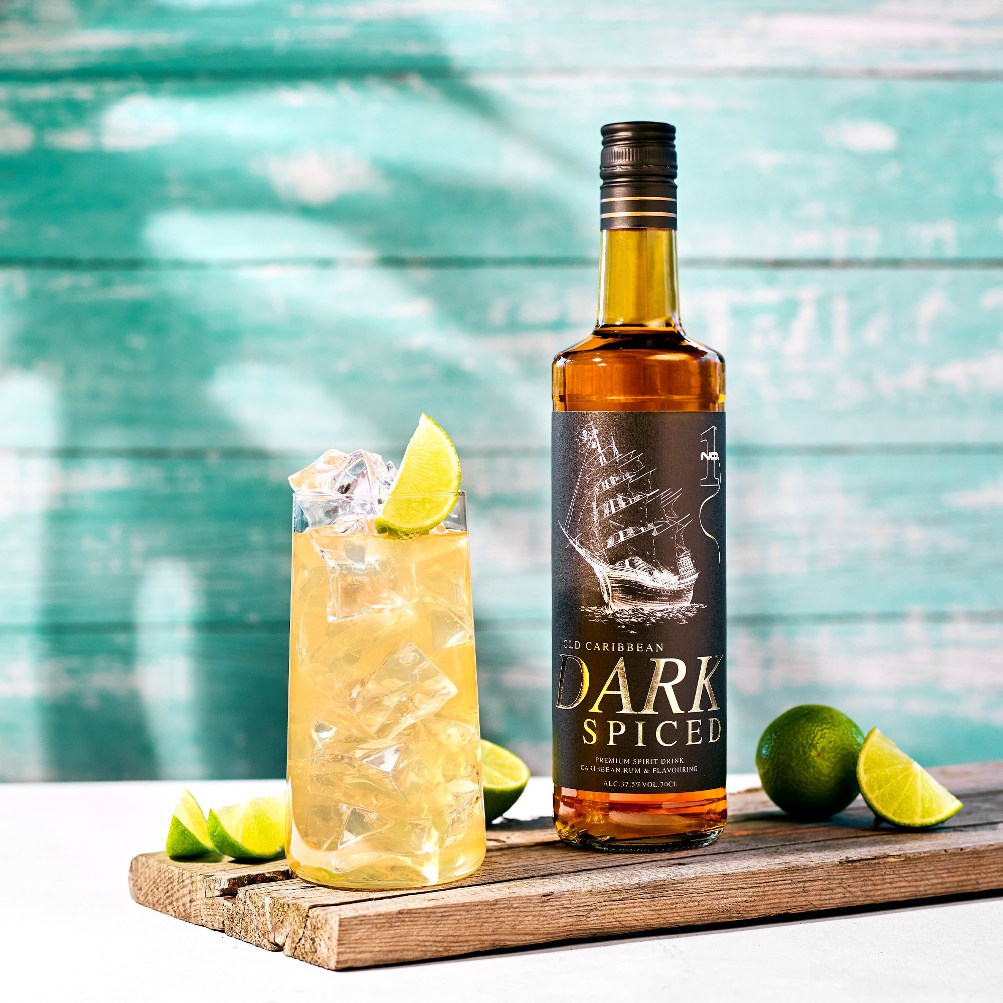 No.1 Old Caribbean Dark Spiced rum with ginger ale cocktail, lime garnish and refreshing ice drink