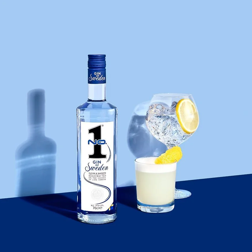 No.1 Premium Dry Gin from Sweden with cocktails, lemon garnish and ice drinks