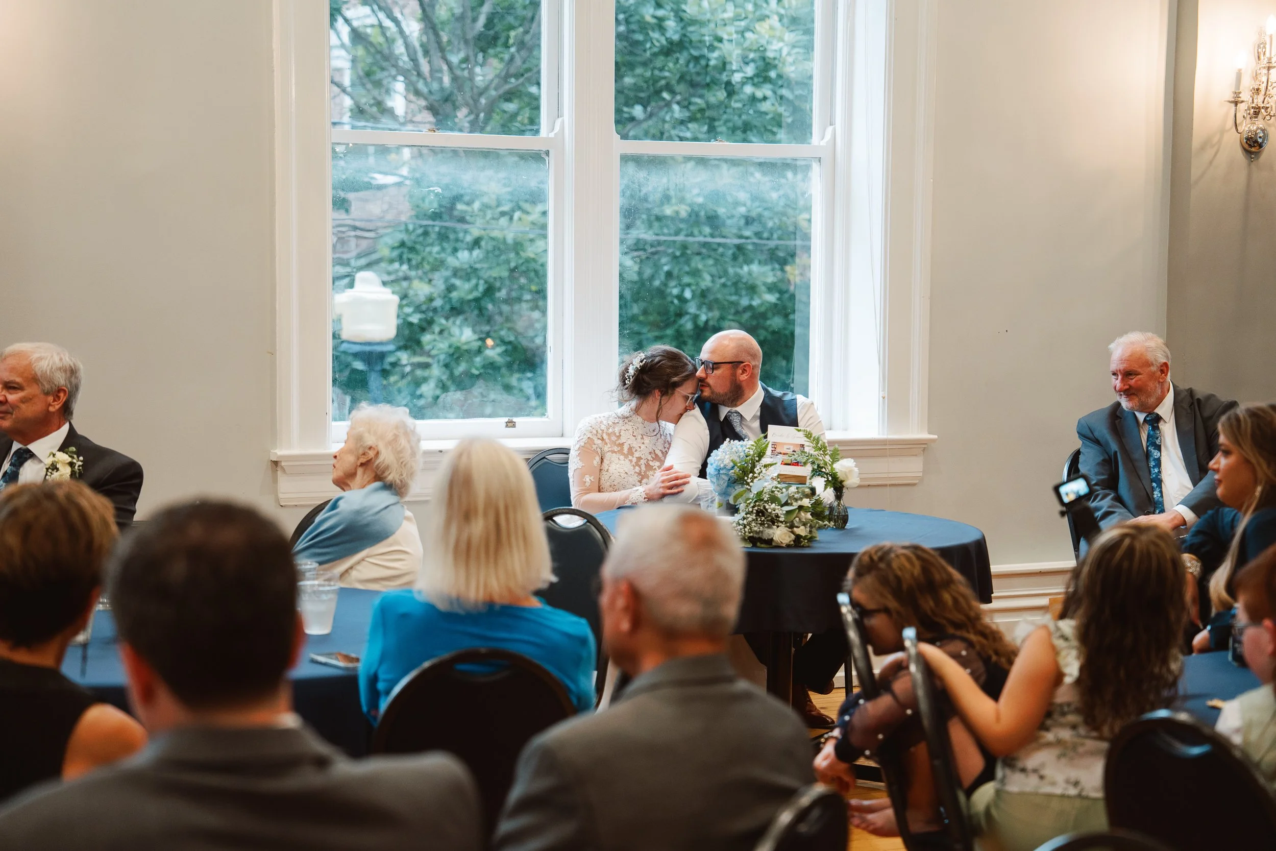 Relaxed candid moment between bride and groom during wedding day, authentic documentary photography Lexington KY