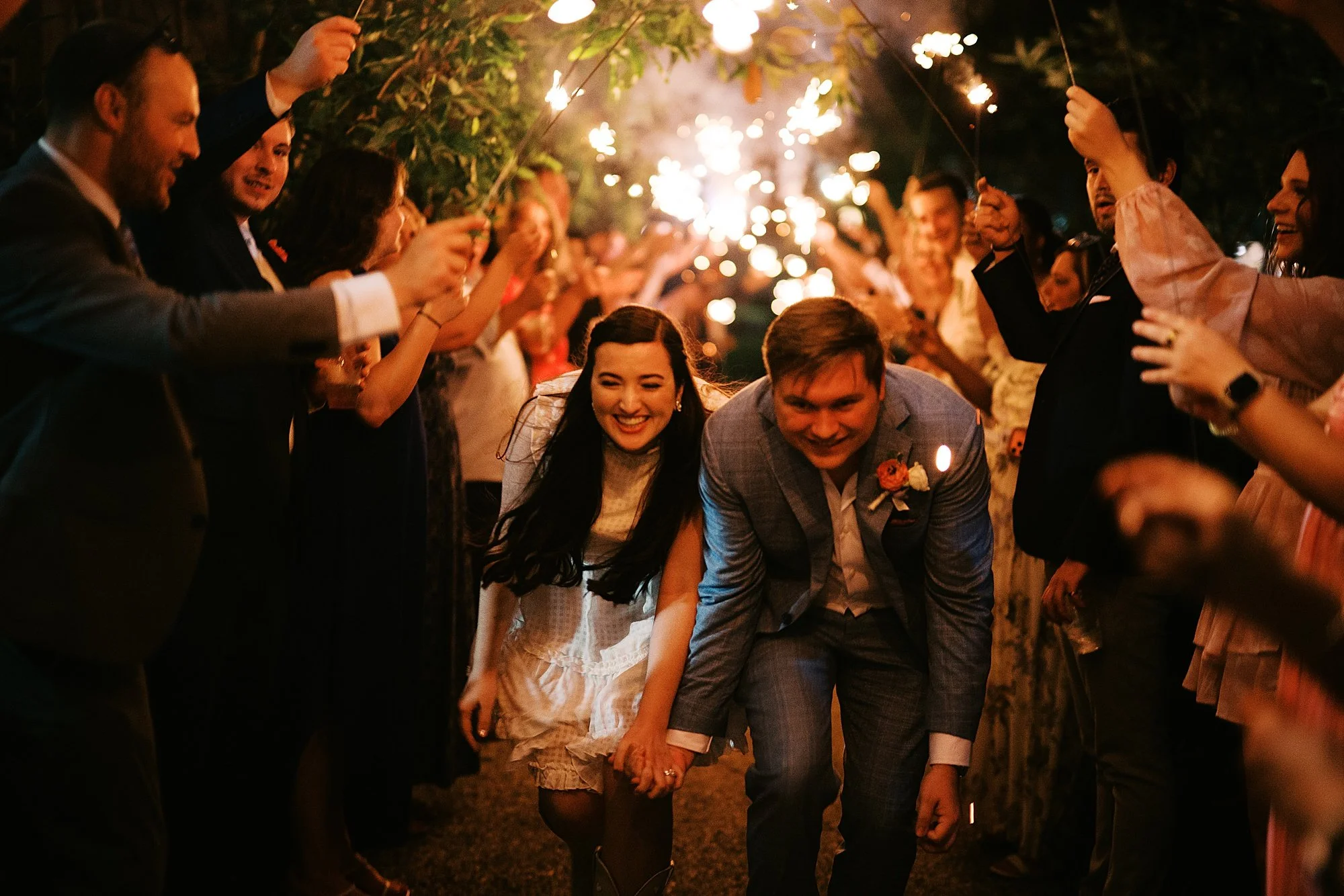 Bride and groom sparkler exit at Fasig-Tipton wedding in Lexington Kentucky