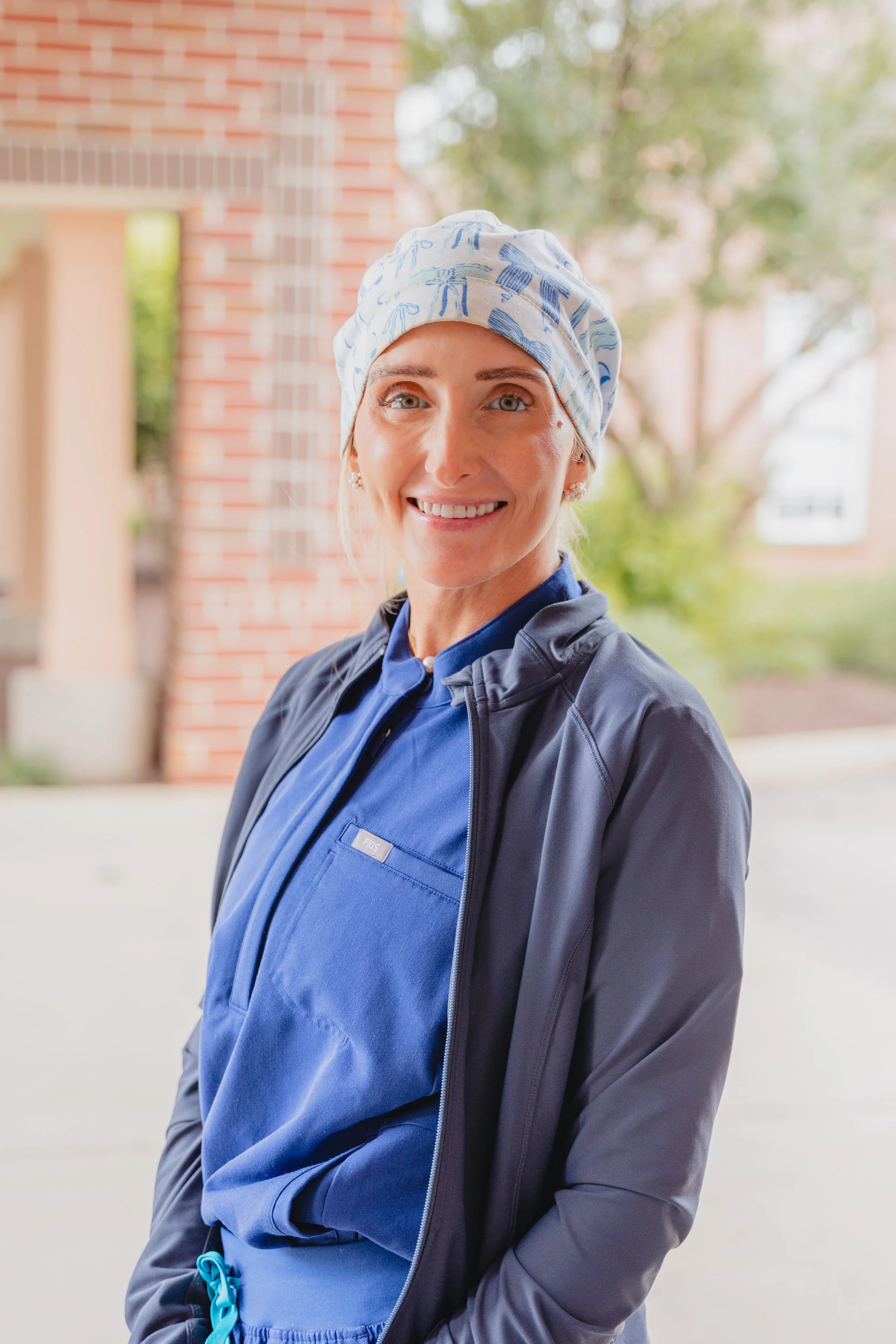 Outdoor headshot of Danielle Hendricks, Vascular Interventional Tech at H&V