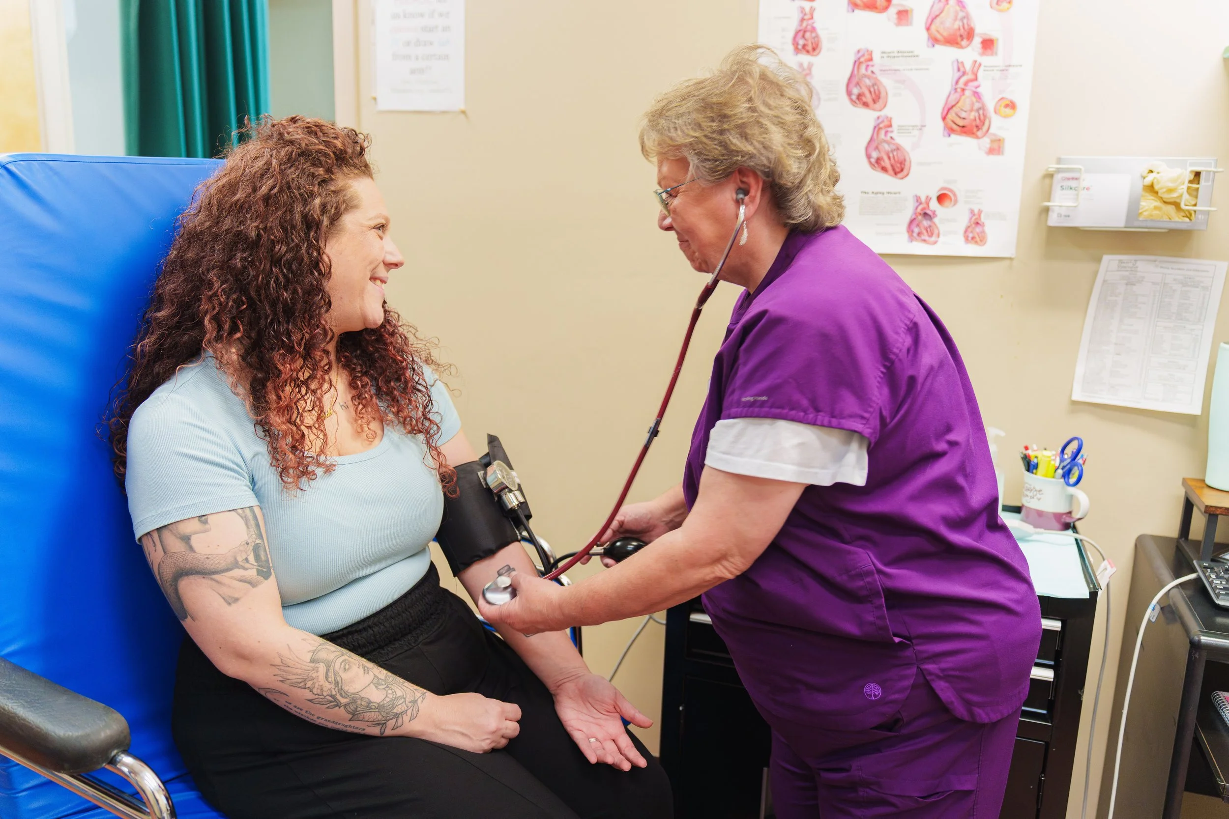 H&V nurse taking a patient's blood pressure