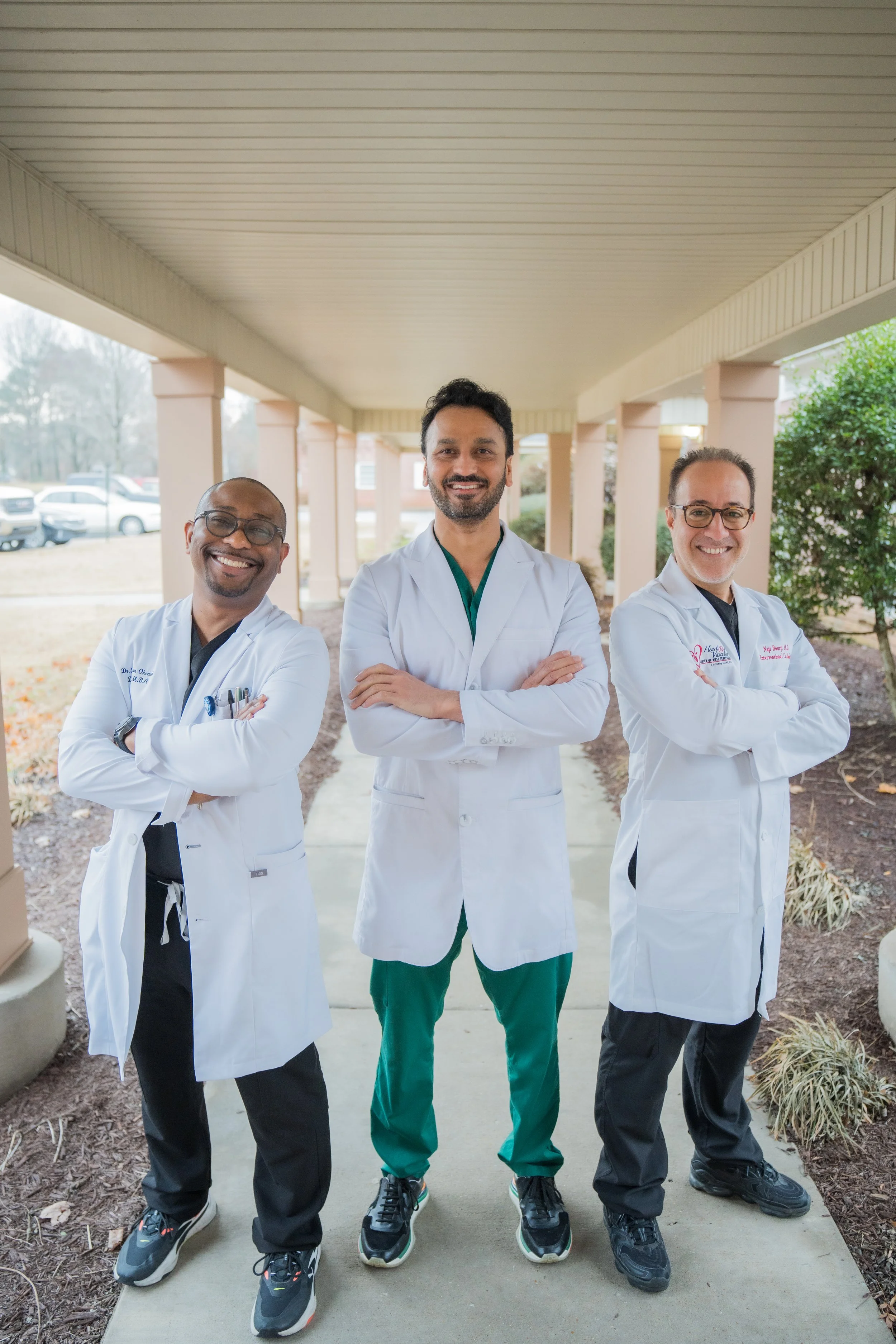 Photo of Dr. Okewole, Dr. Patel, and Dr. Bourji