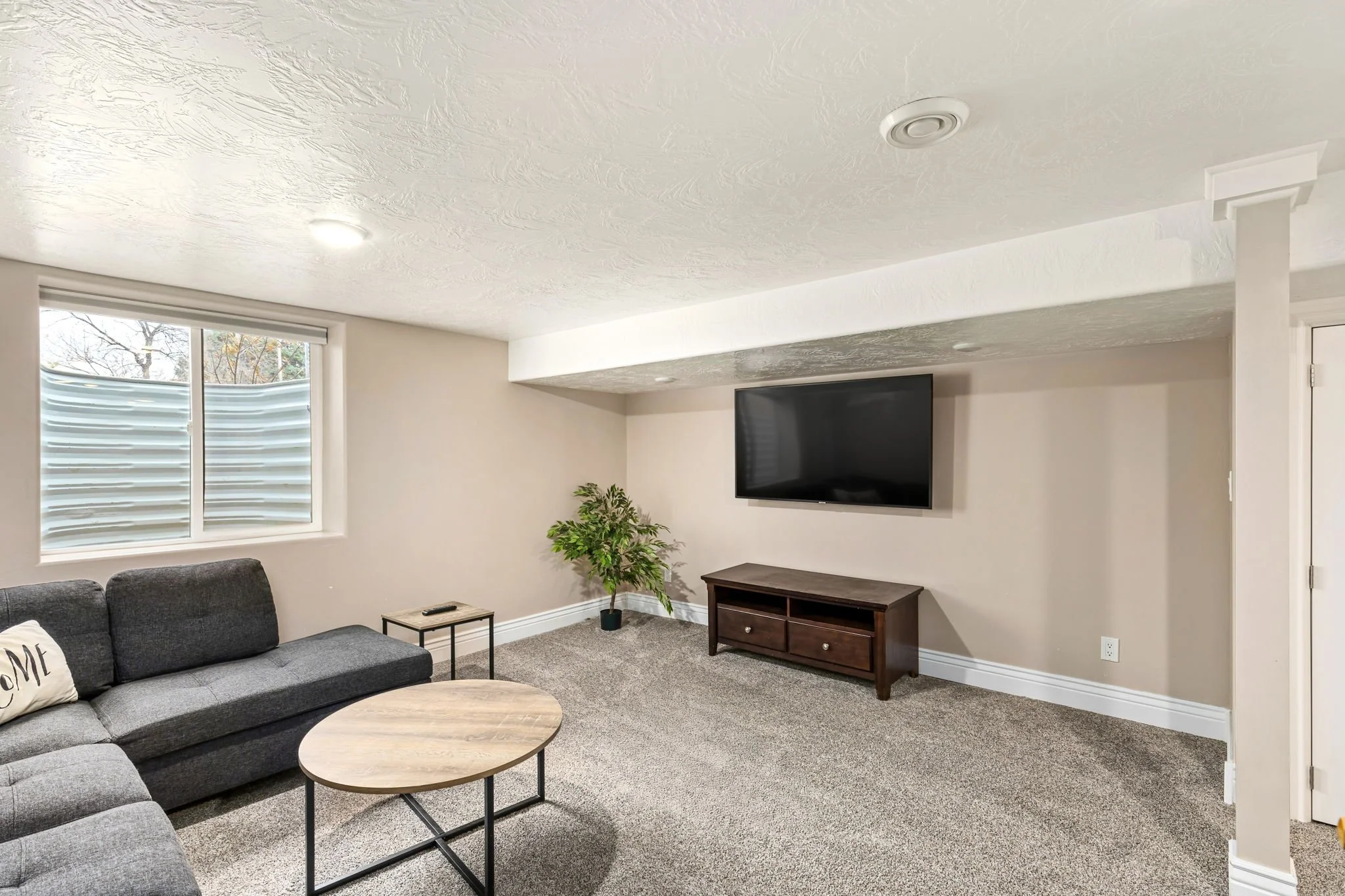 Wrecked-Refined-Basement-Entertainment-Space-Smart-TV-Sectional-Family-Fun-Great-Falls-MT.jpg.jpg