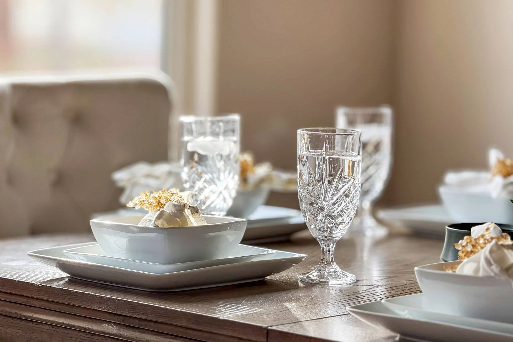 Professionally styled dining table in a luxury Montana home, showcasing how strategic presentation and high-quality photography support effective real estate marketing.
