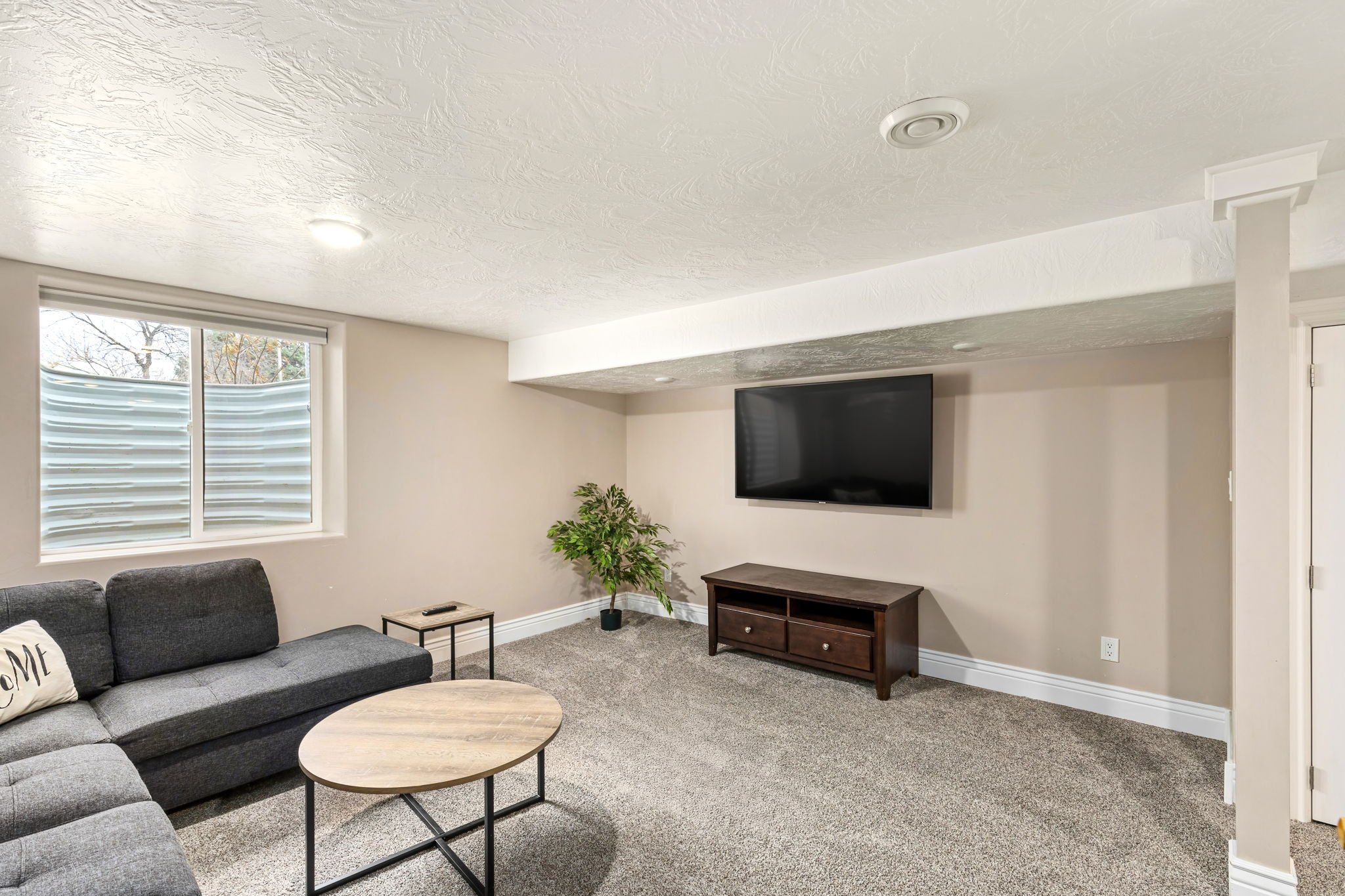 Wrecked-Refined-Basement-Entertainment-Space-Smart-TV-Sectional-Family-Fun-Great-Falls-MT.jpg.jpg