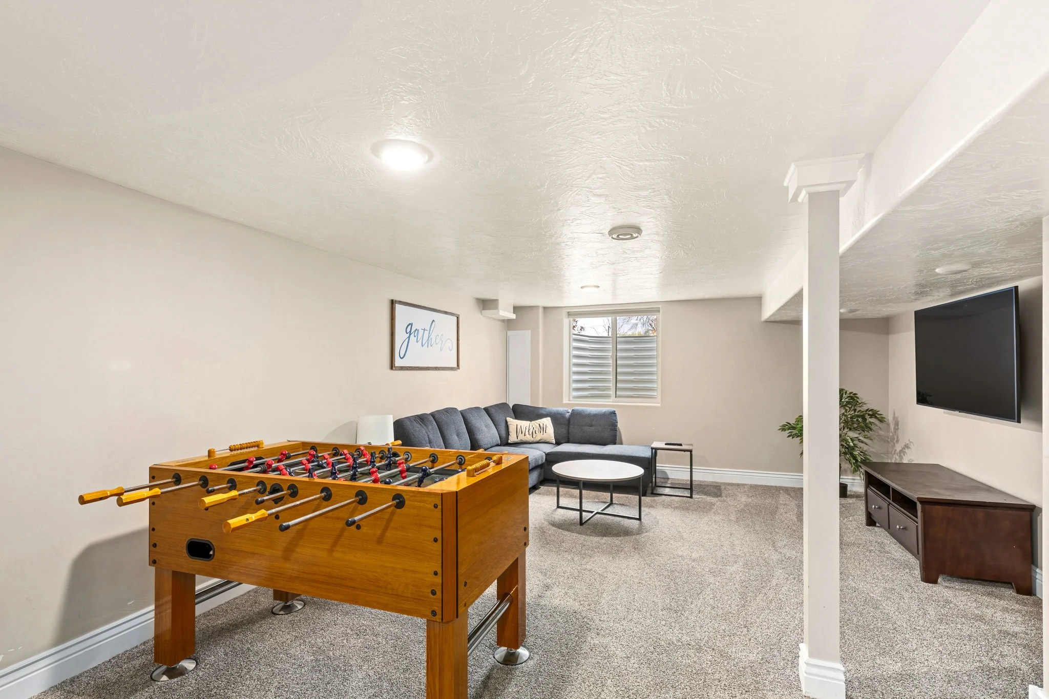Wrecked-Refined-Luxe-Basement-Entertainment-Room-Foosball-Sectional-Smart-TV-Great-Falls-MT.jpg (2).jpg