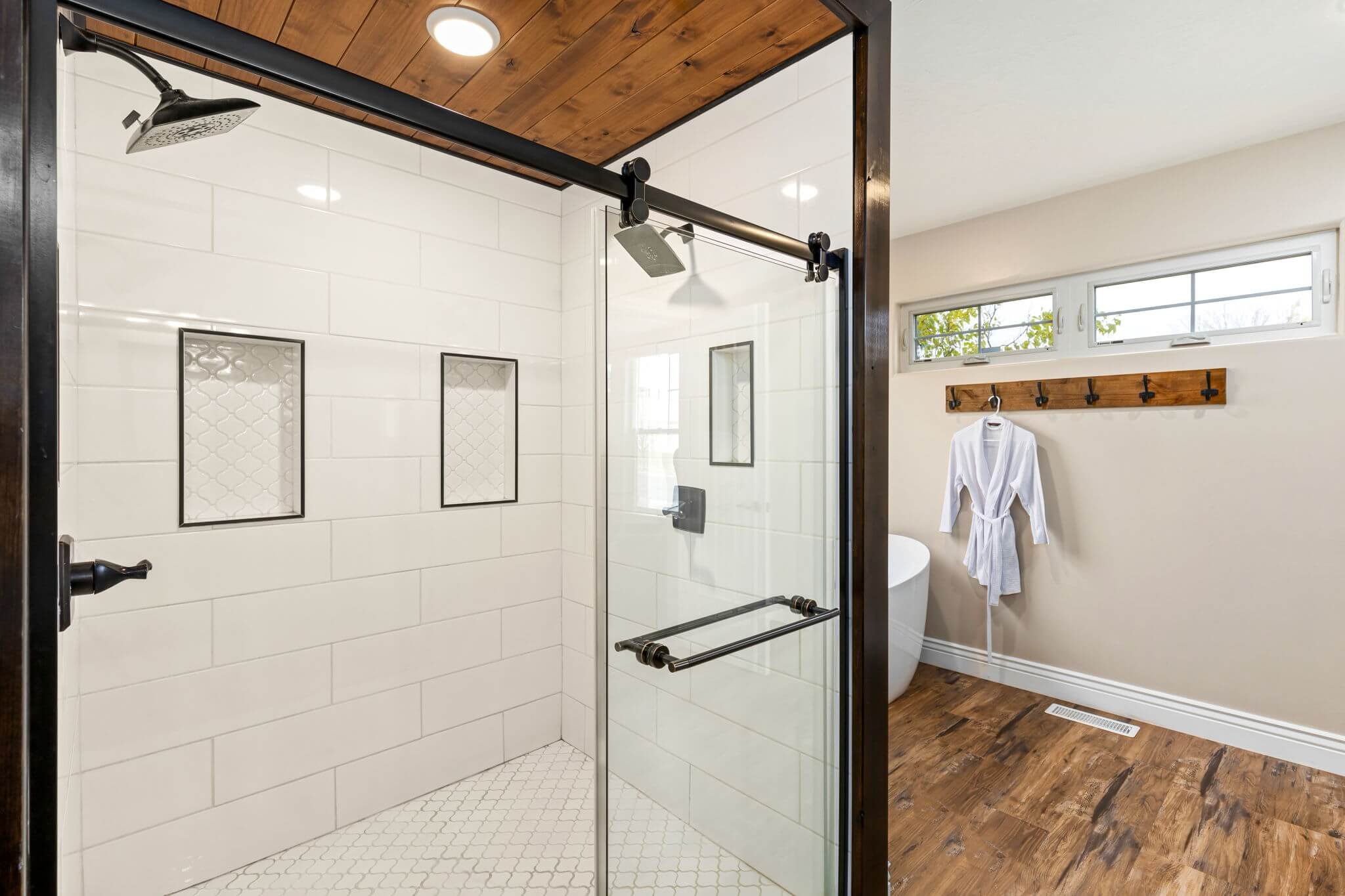 Spa-style walk-in shower in a Great Falls Montana home, showing how cleanliness, maintenance, and overall condition communicate value to buyers.