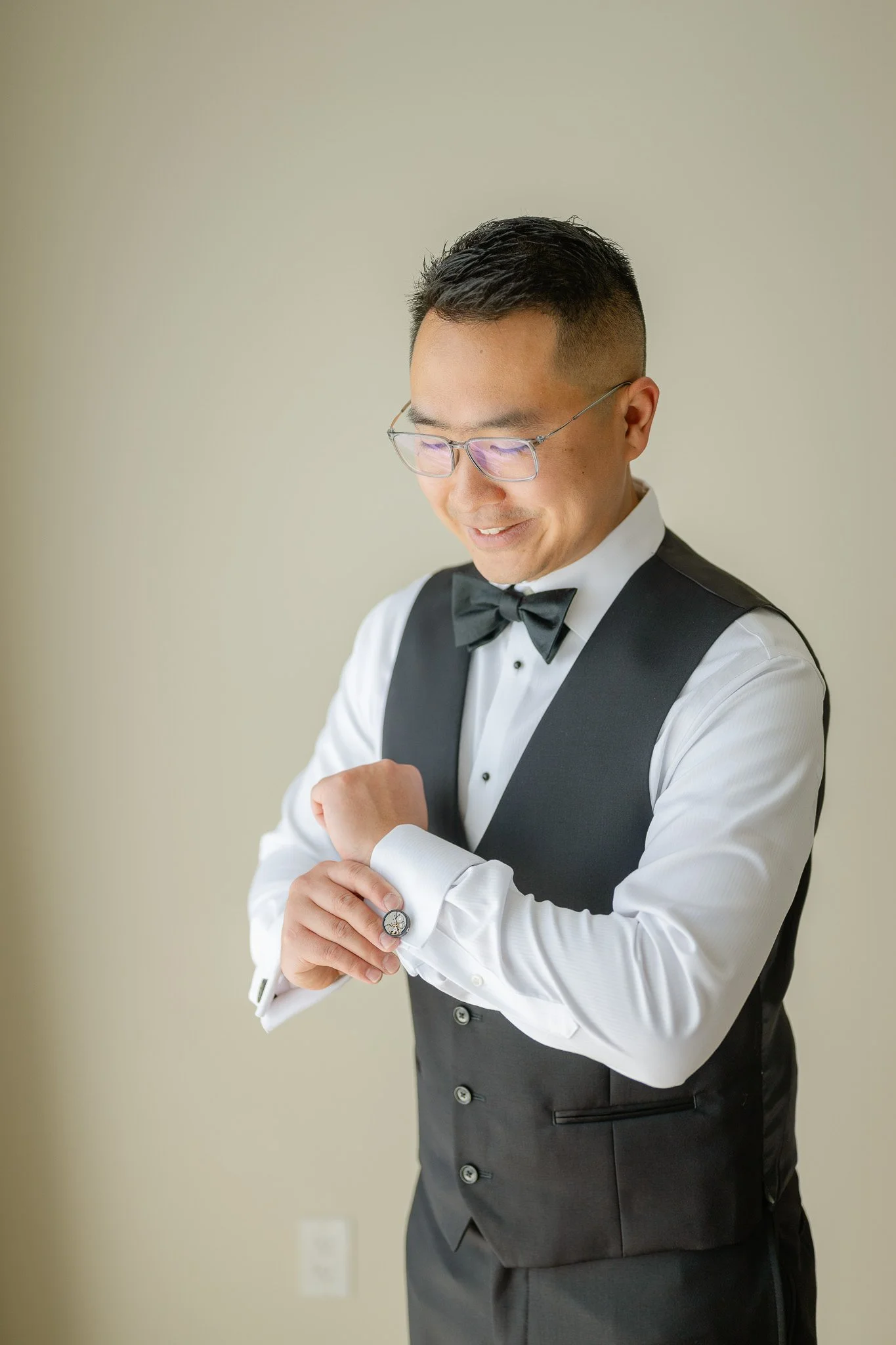 jacket-adjustment-groom-wedding-pose-2.jpg