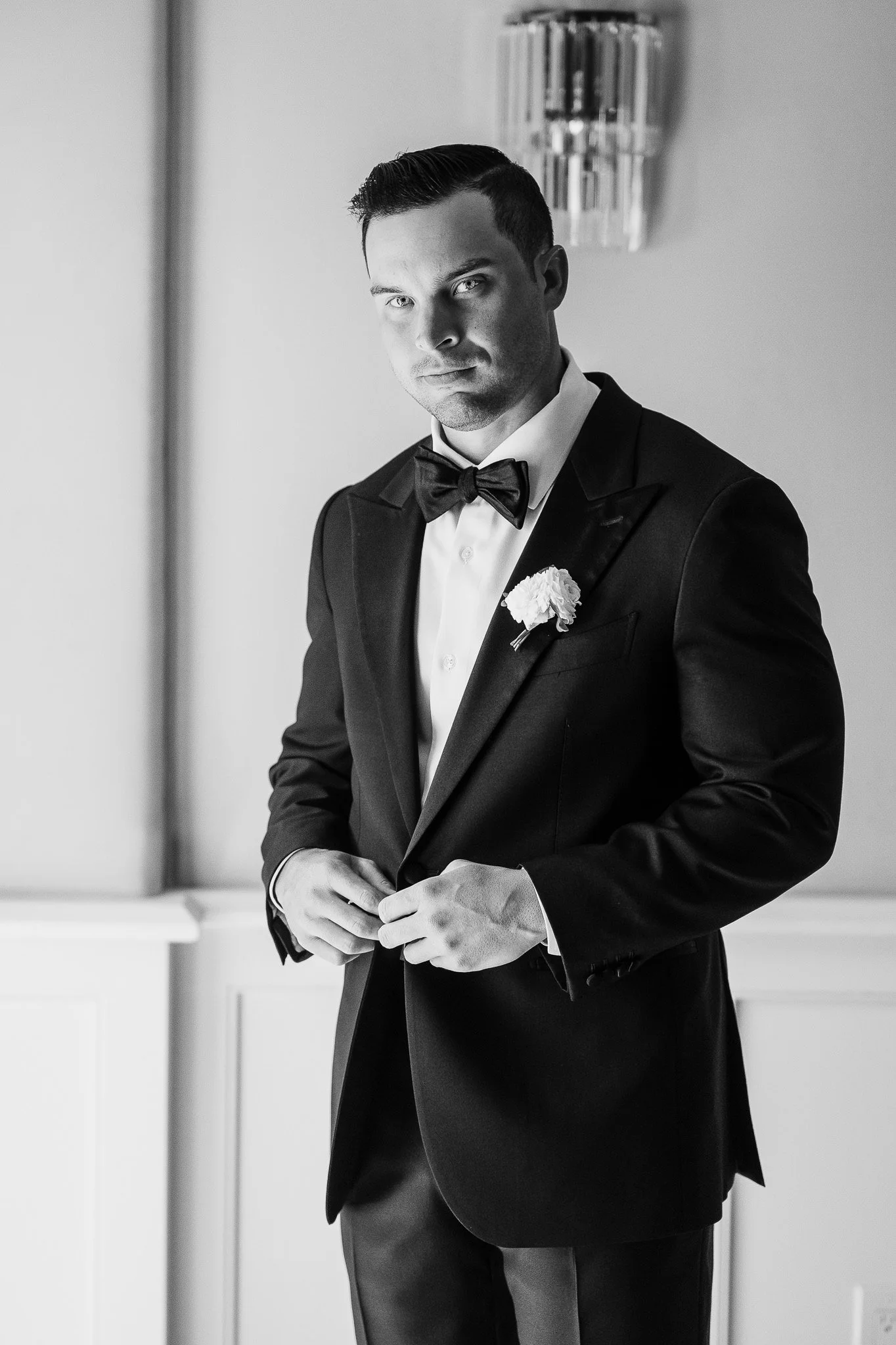 jacket-adjustment-groom-wedding-pose-3.jpg
