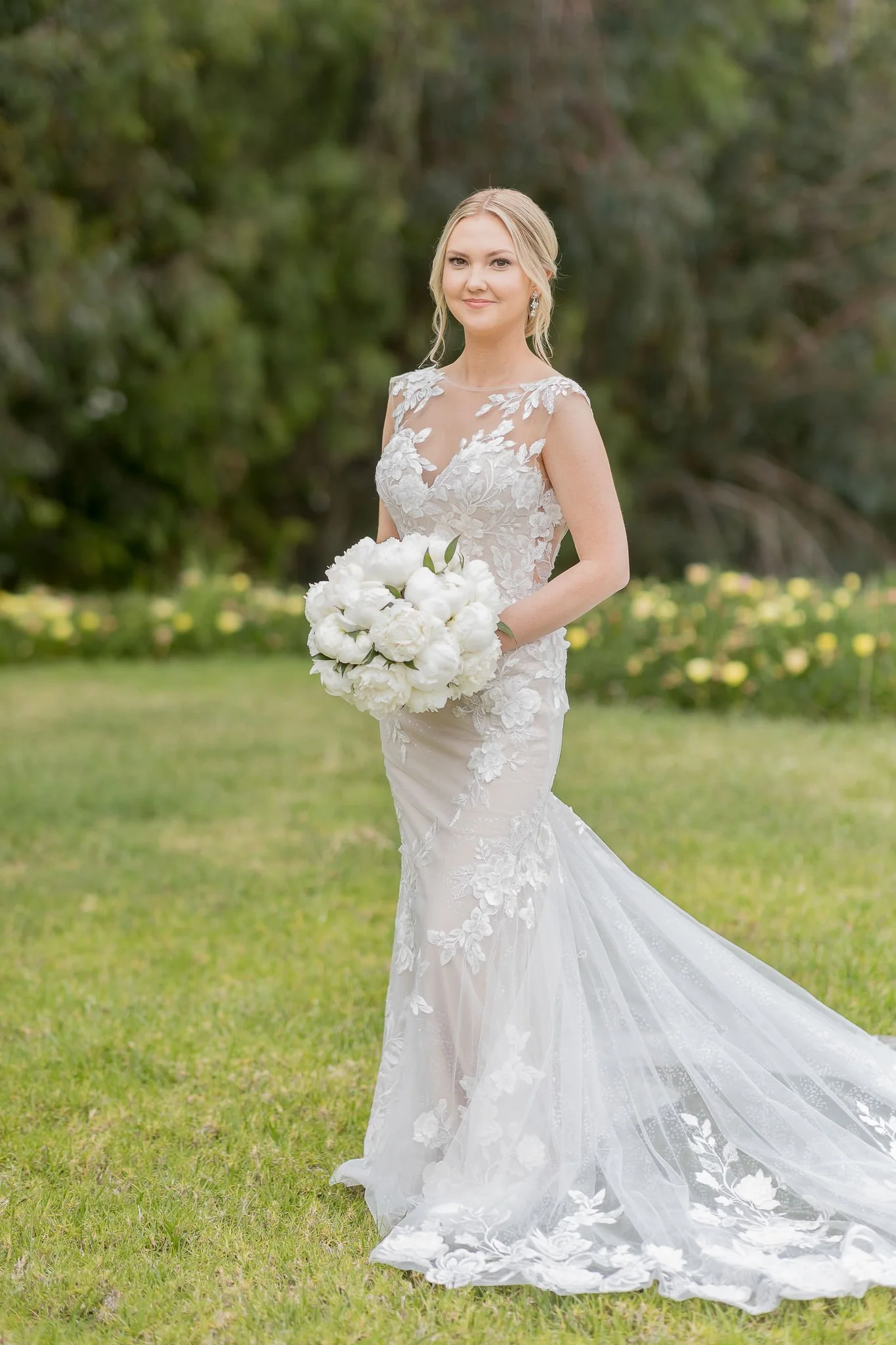 bride-holding-boquet-wedding-pose-1.jpg