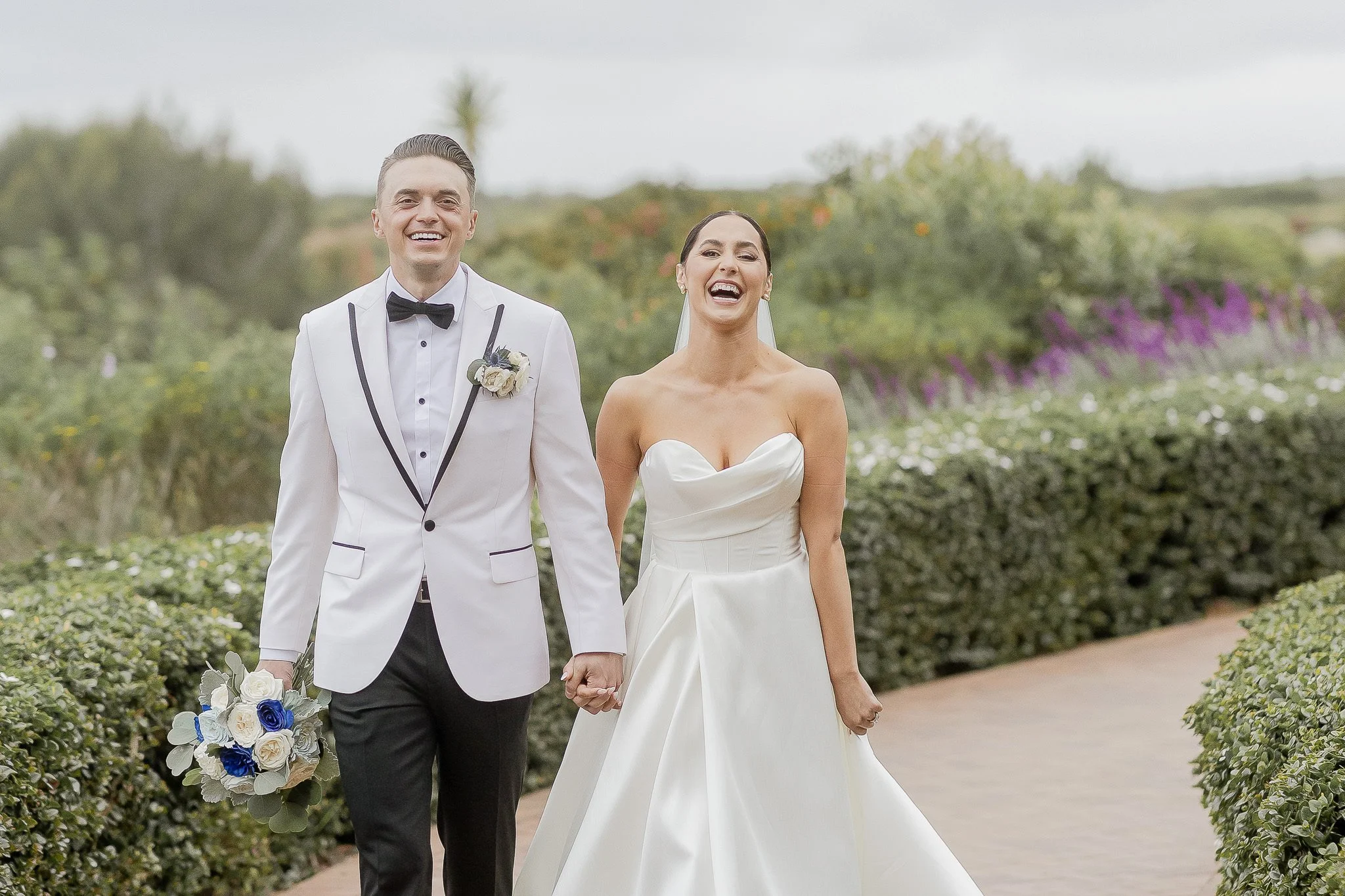 couple laughing in wedding photo from receiving good direction from photographer