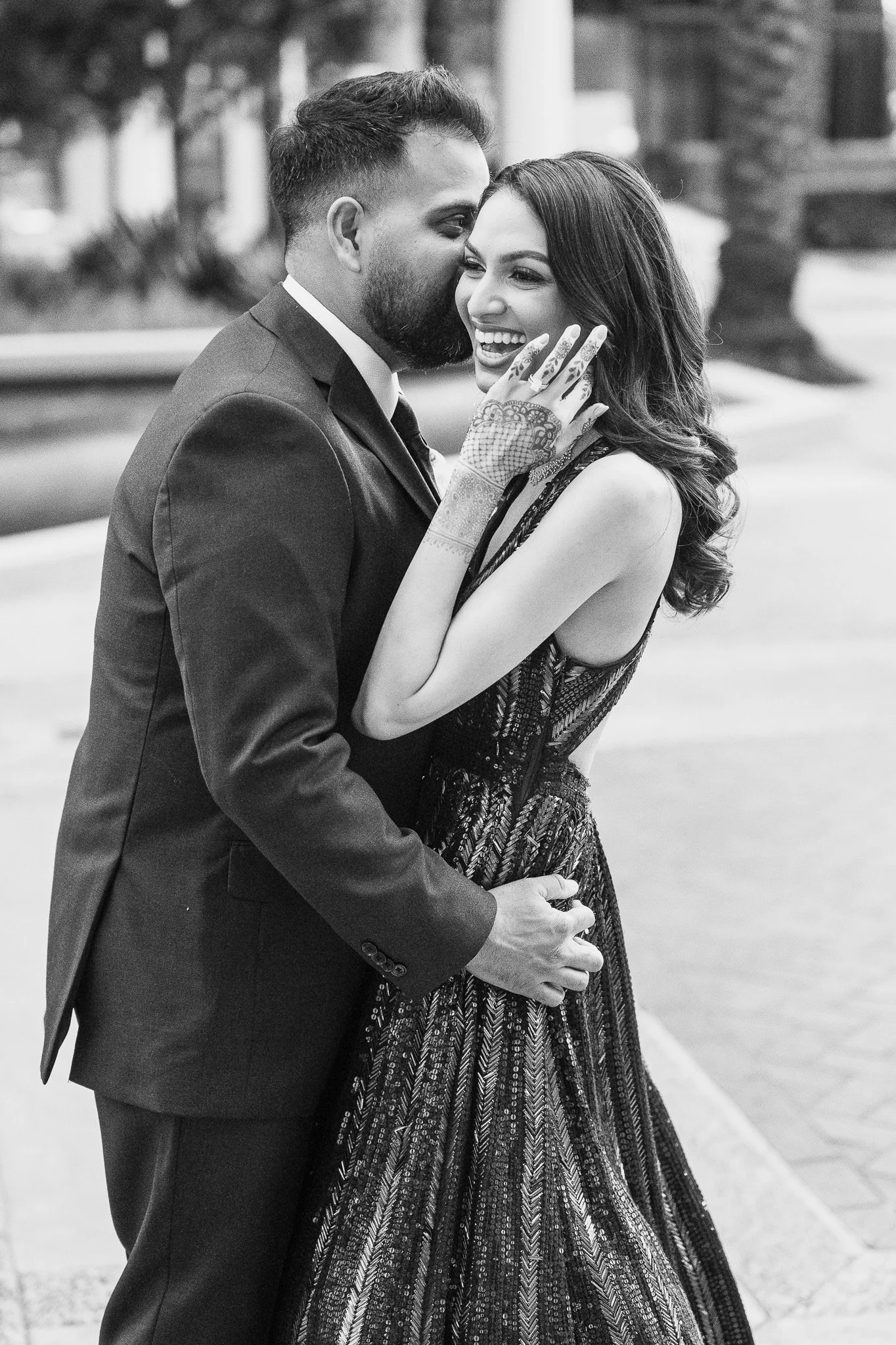 Candid wedding photography showing couple laughing during invisible direction session