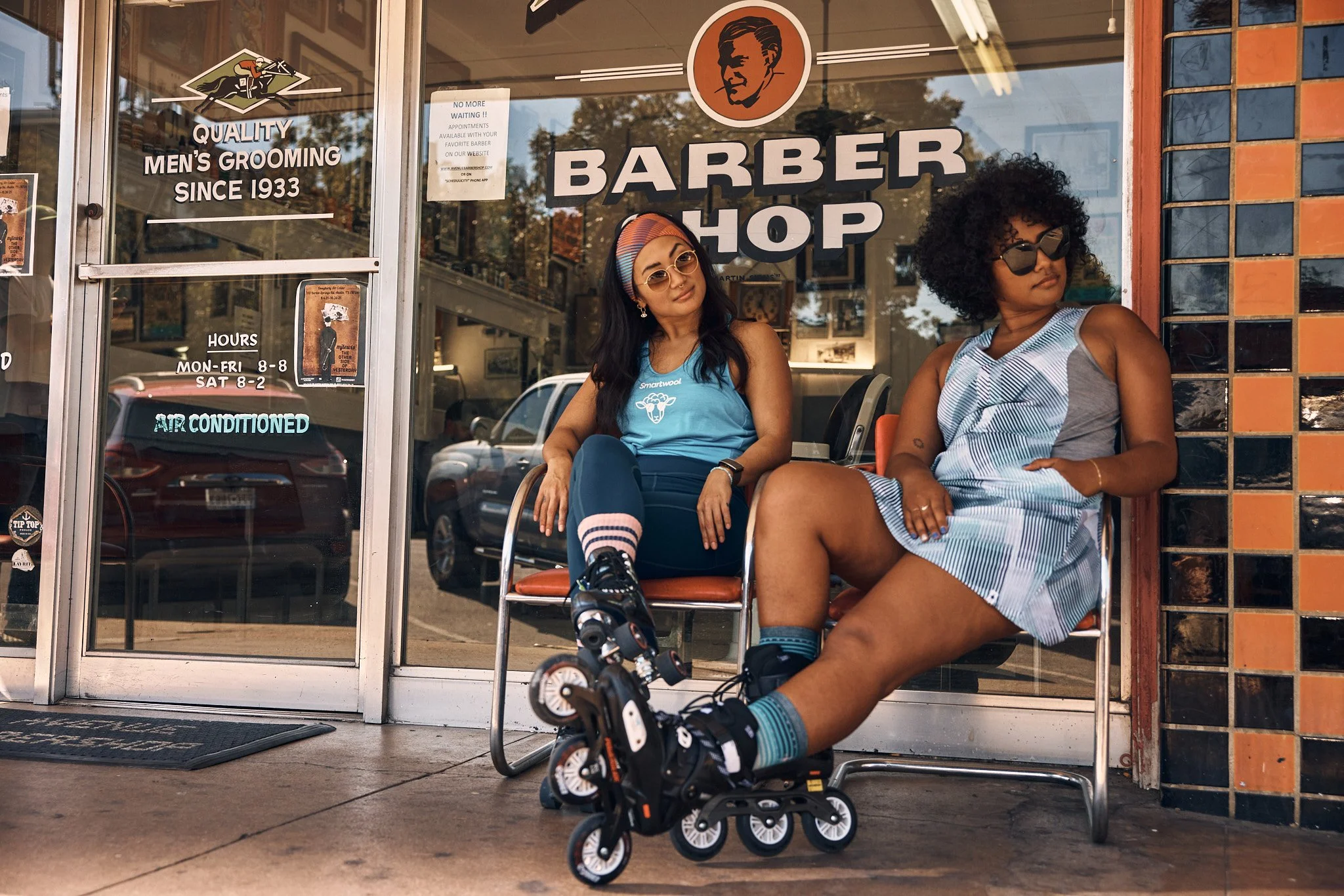 Friends with roller skates outside an Austin barber shop, Smartwool Spring 2021 campaign, photography by Dag Larson