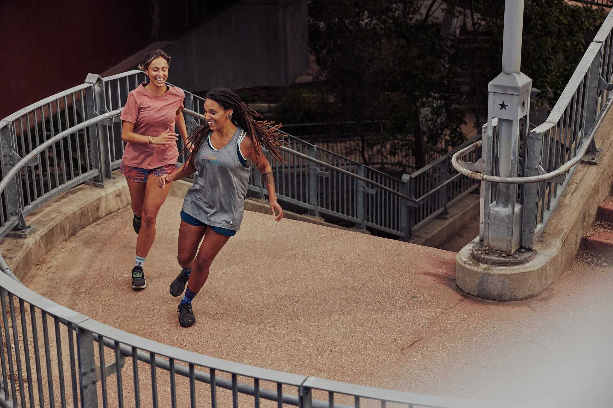 Two runners on a curving ramp in Austin, Smartwool Spring 2021 campaign, photography by Dag Larson