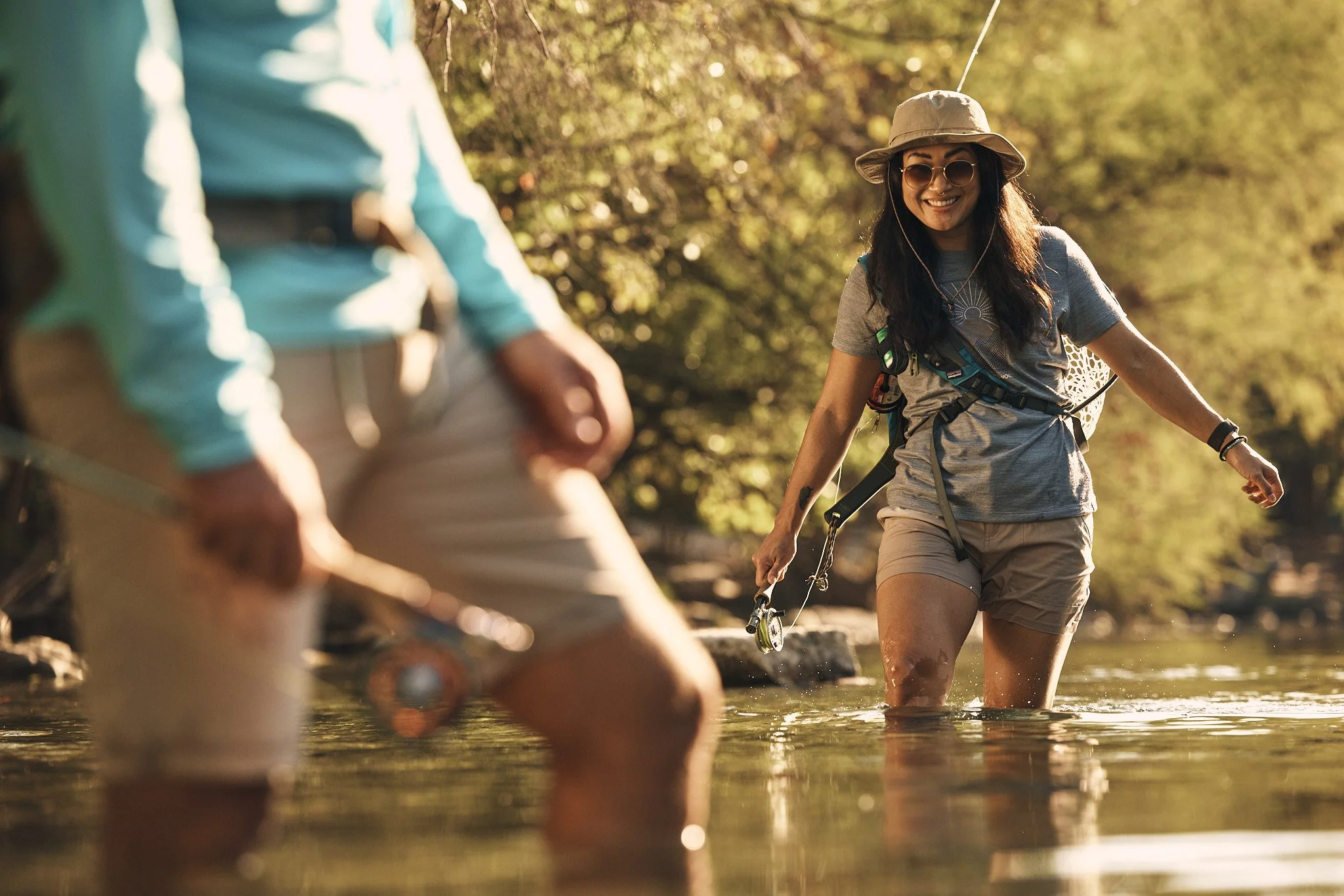 Close up of anglers wading a Texas river, Smartwool Spring 2021 campaign, photography by Dag Larson