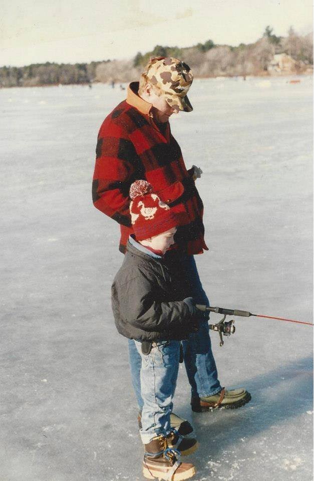 Young Dag Larson ice fishing on a frozen lake in New England