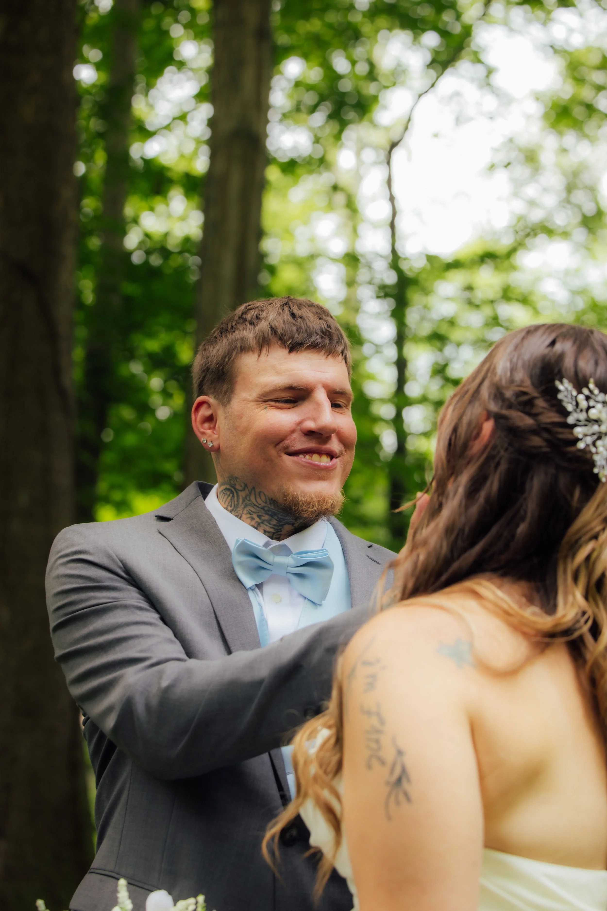 Tender candid wedding portrait of Tyler and Andrea