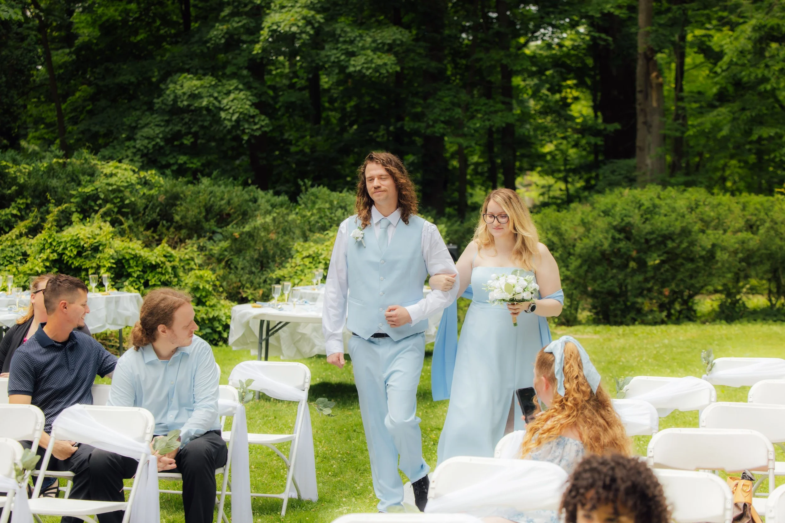 Wedding ceremony processional at Fernwood Botanical Garden