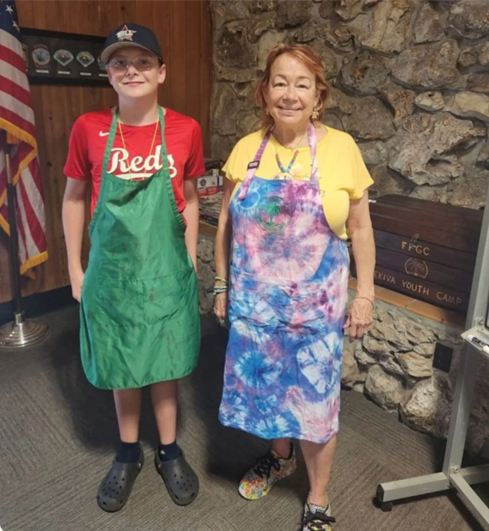 Taryn Polo, District Director XI, with sponsored Wekiva camper Jacob Byrnes