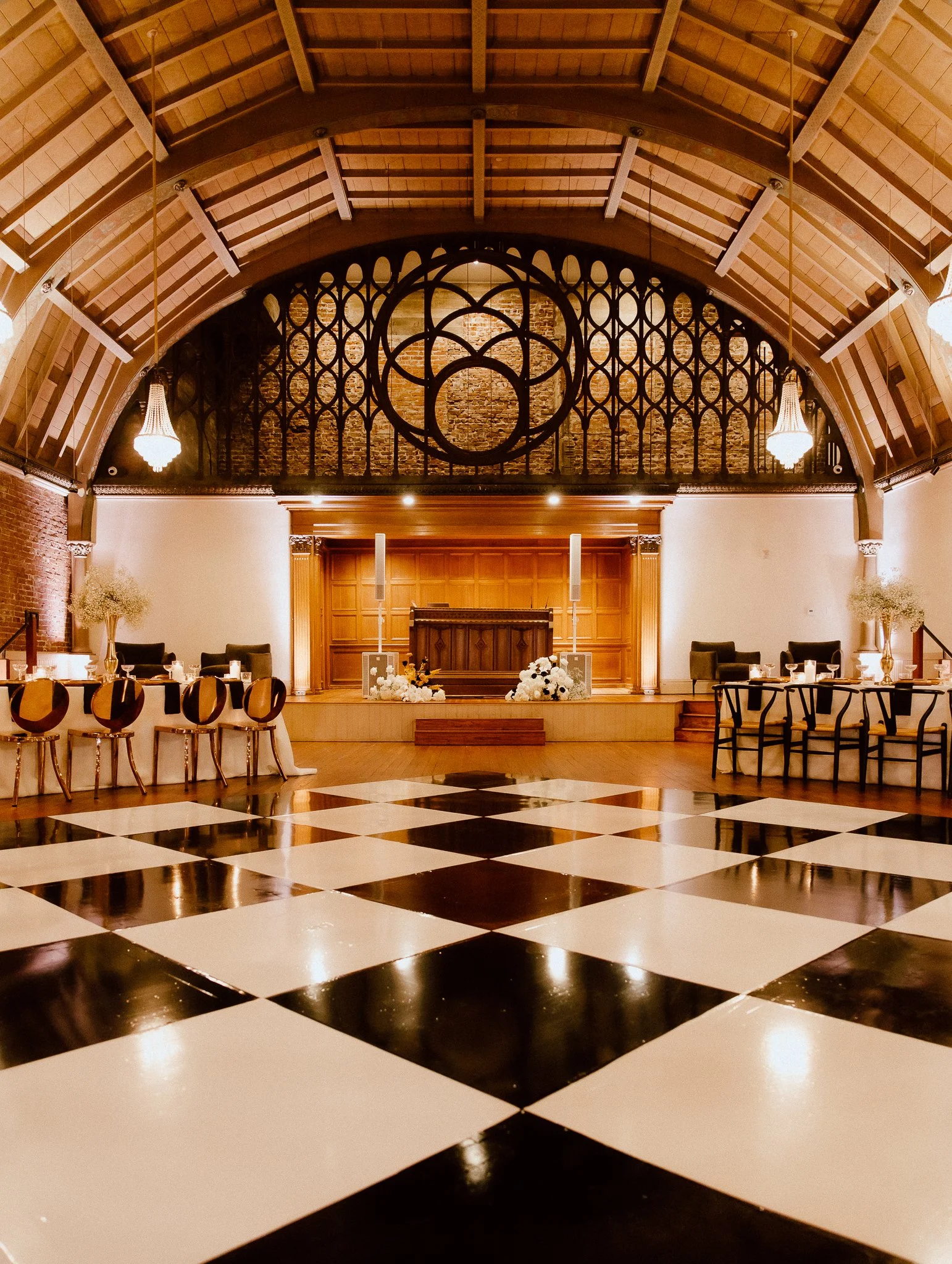 Full perspective of the Altar Long Beach main ballroom ready for a large dinner event, highlighting the expansive table layout.