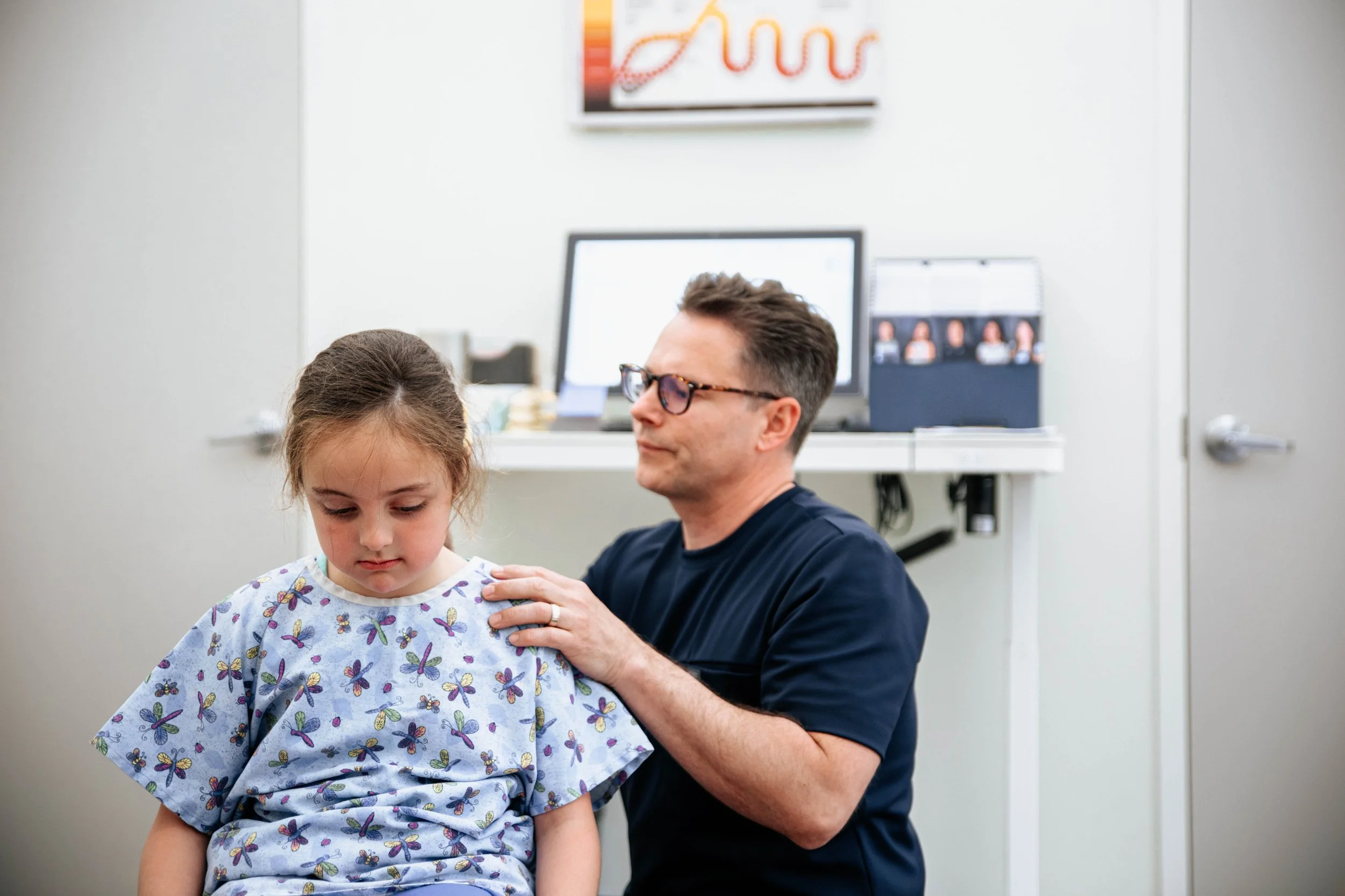 Dr. Prince providing chiropractic care to a chilld