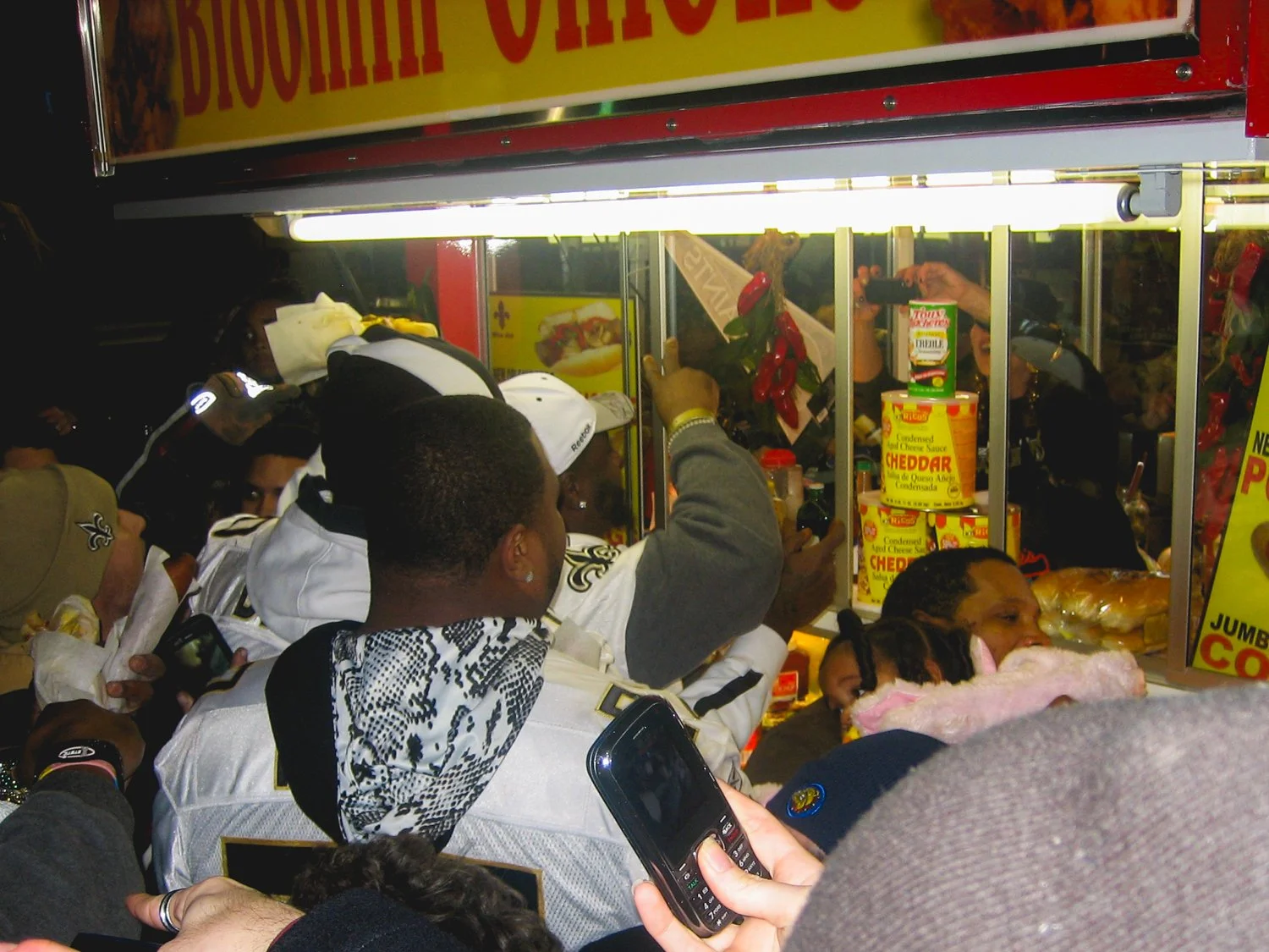 Vendor takes photos of the players.