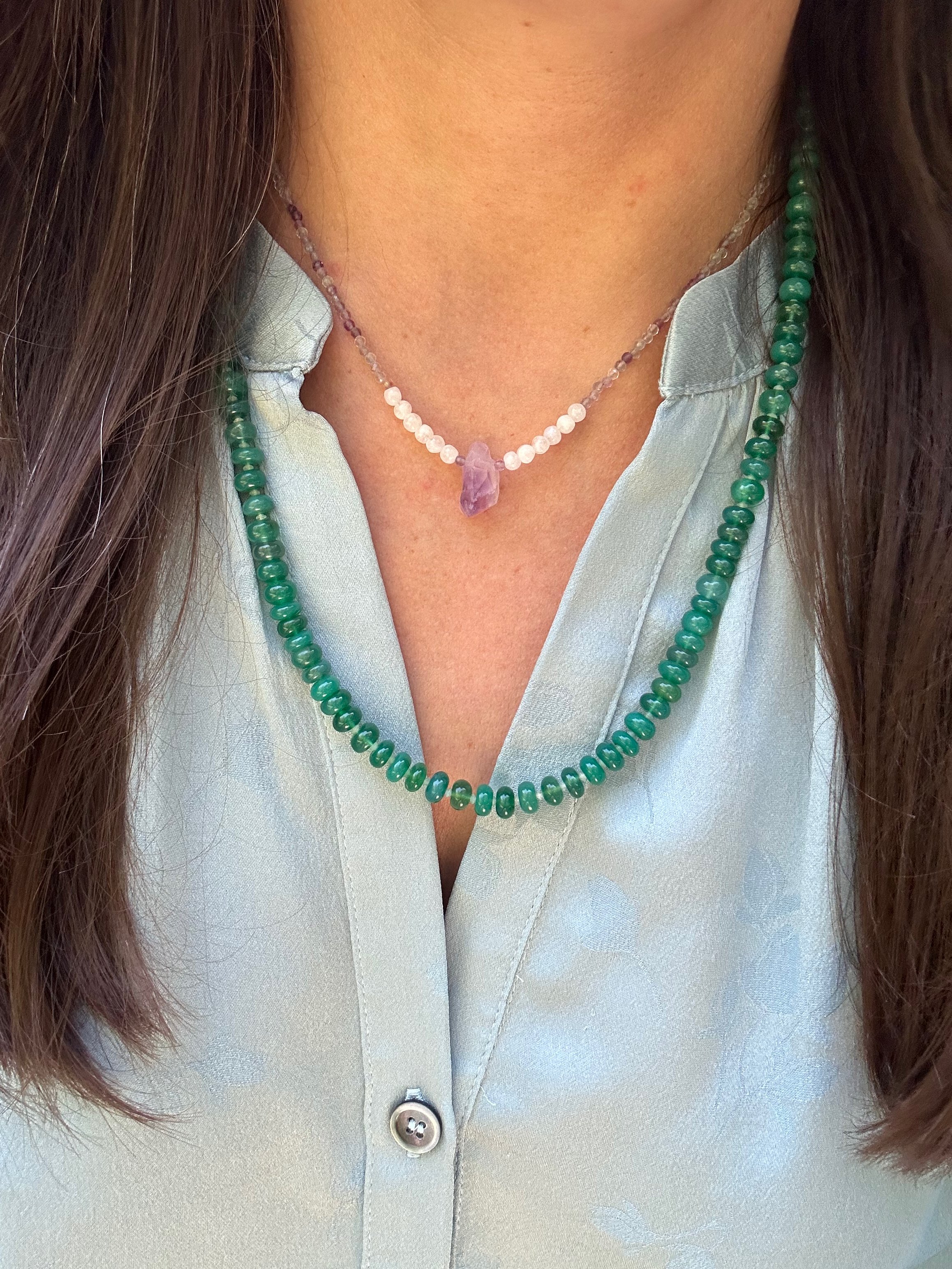 Green Onyx Strand Necklace with Aquamarine. Onyx stones are smooth and catch the light beautifully on a light blue silk shirt and layered with a shorter amethyst and tourmaline necklace