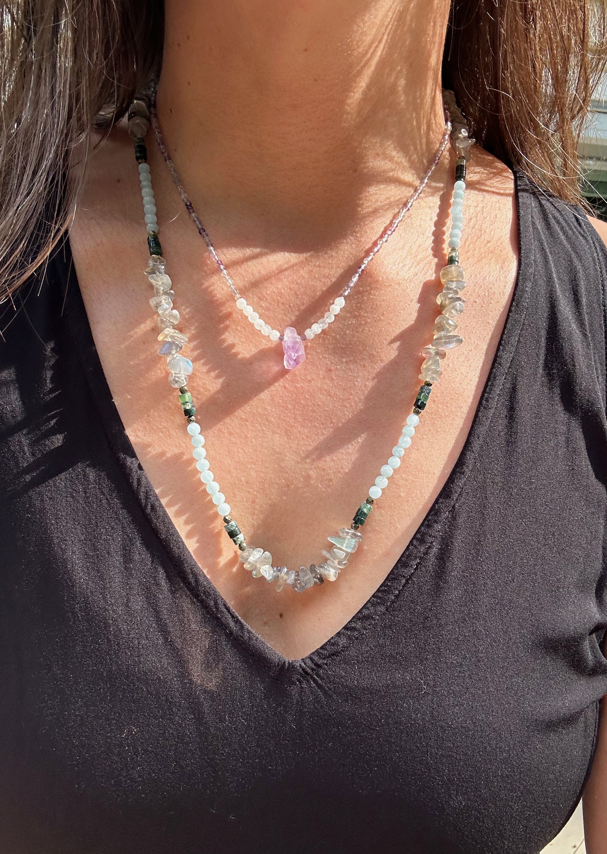 Reflective Labradorite chips are highlighted in sections by heishi Moss Agate, Aquamarine and Pyrite in this beautifully balanced handmade long necklace, layered with a shorter necklace