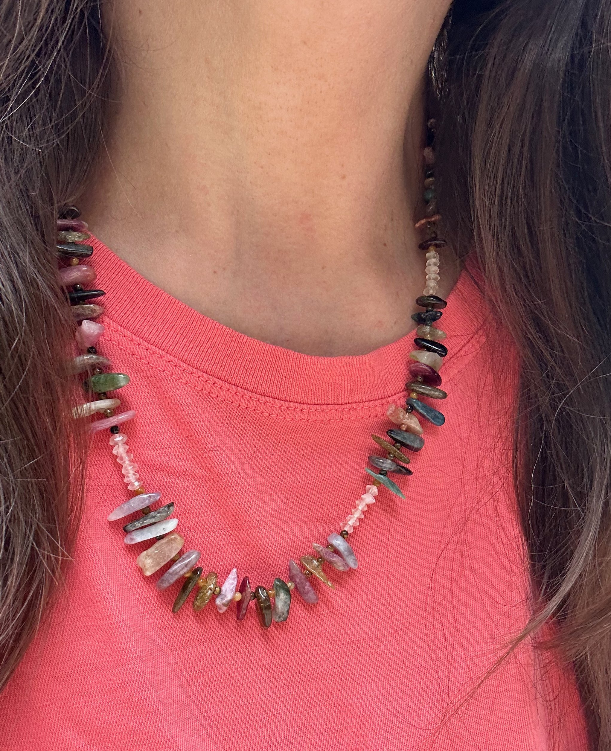 Watermelon Tourmaline sticks stack up with Tiger’s Eye in this gorgeous necklace with breaks of beautiful Rose Quartz on a pink t-shirt 21 inch necklace