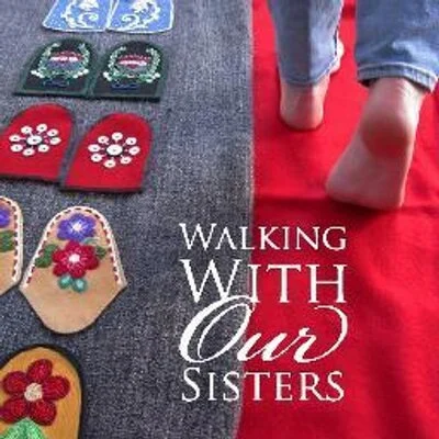 Text that reads Walking With Our Sisters over a photo of walking feet and beaded items