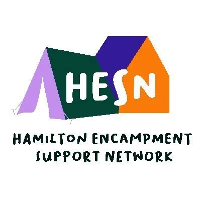 Logo: Text that reads HESN Hamilton Encampment Support Network over a icon of a tent and house