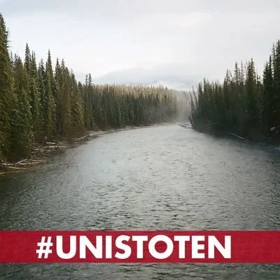 #UNISTOTEN over a picture of a river lined with trees
