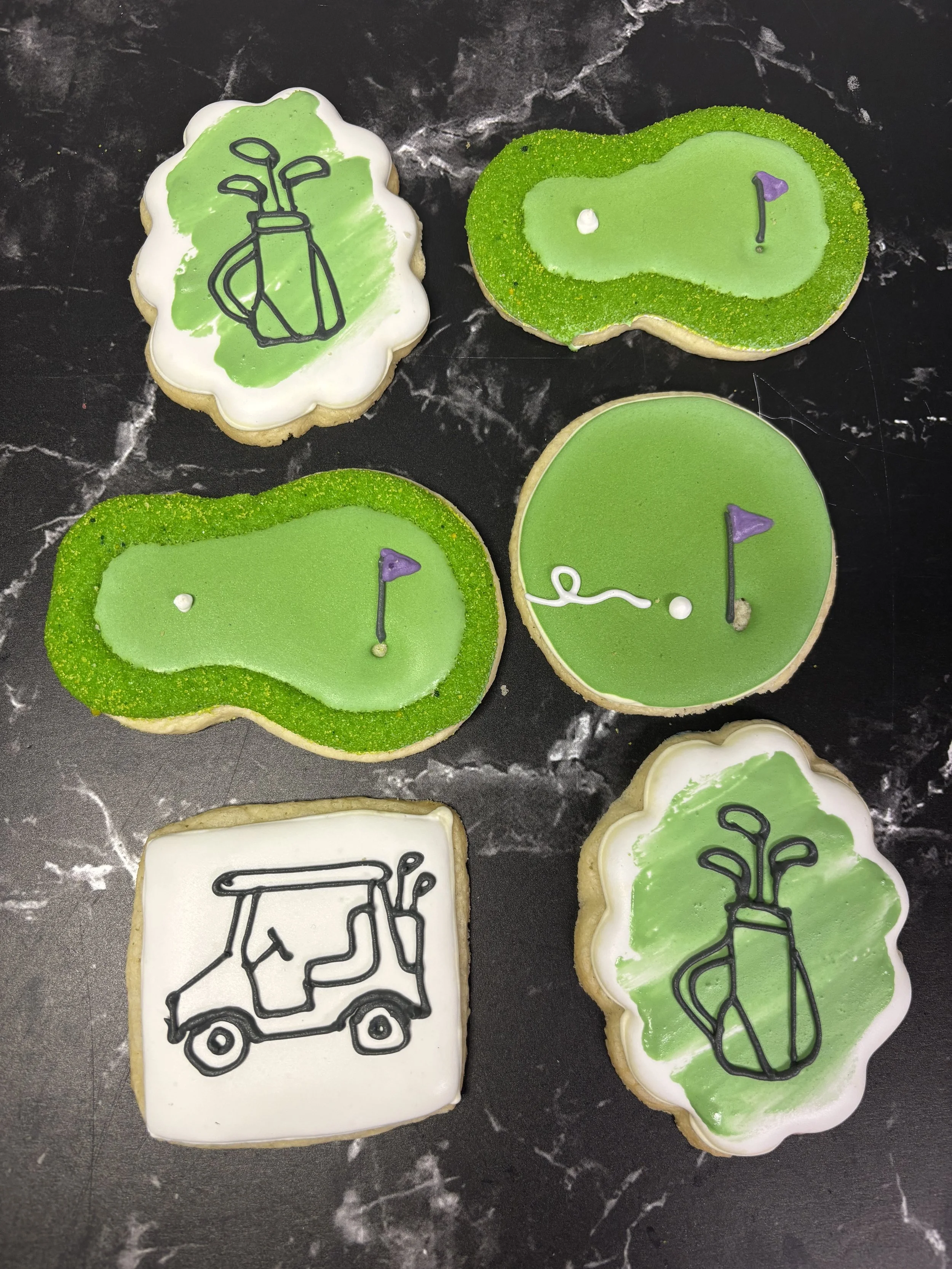 Golf cookies decorated by Artful Cakery by Julie