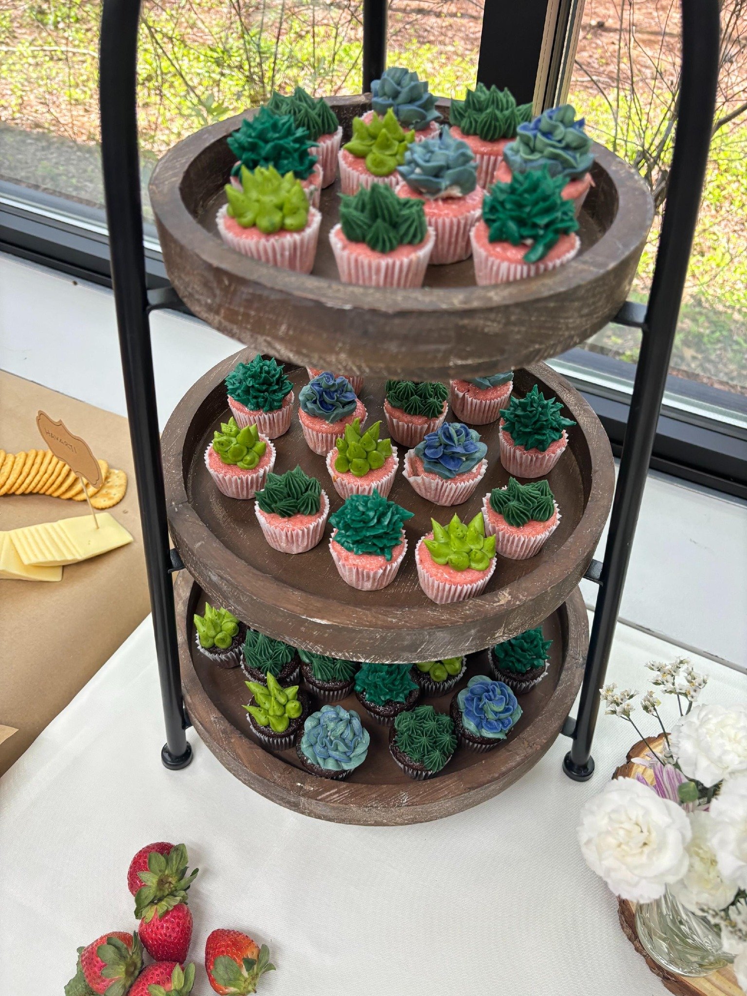 Mini succulent cupcakes for a wedding dessert table