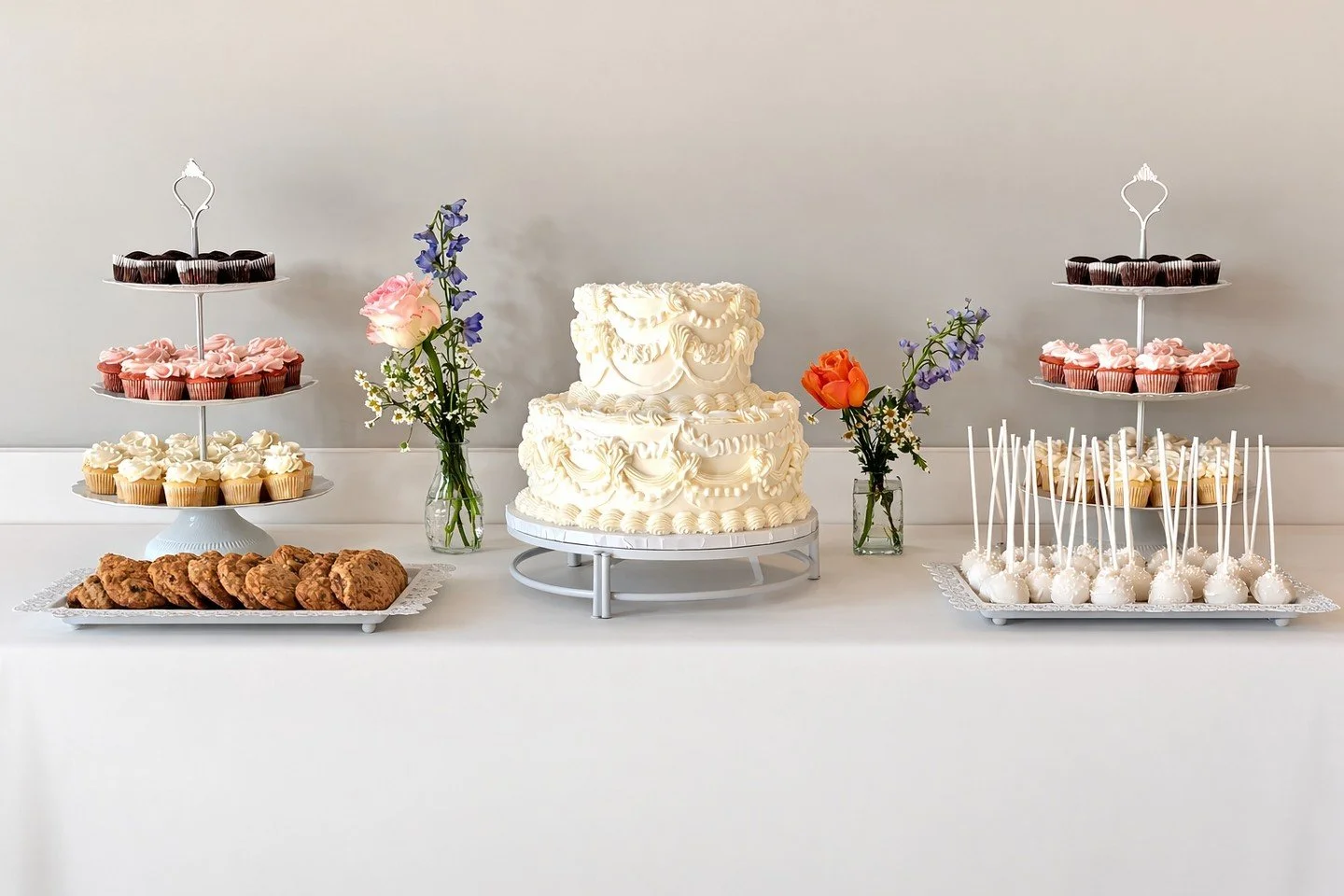 A full dessert table moment 🤍

From cake and cupcakes to cake pops to cookies, this setup gives guests options&mdash;and creates a beautiful focal point.

✨ Atlanta dessert tables by Artful Cakery by Julie

Would you do a full dessert table? What de
