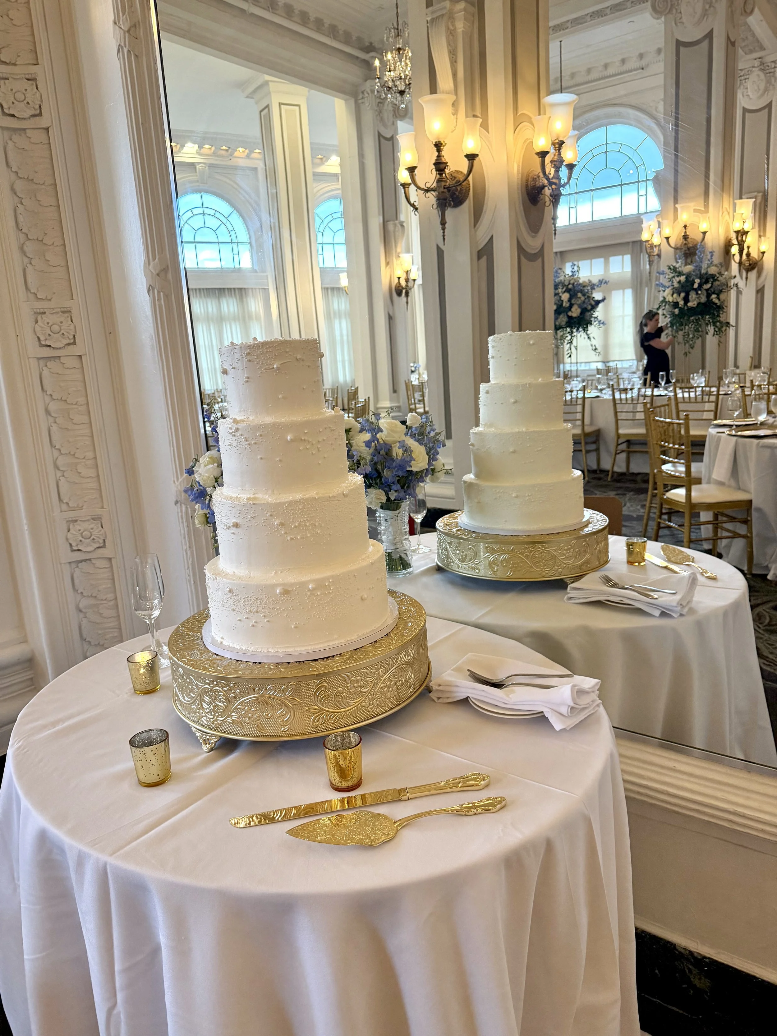 Four tiered buttercream wedding cake with Pearl accents