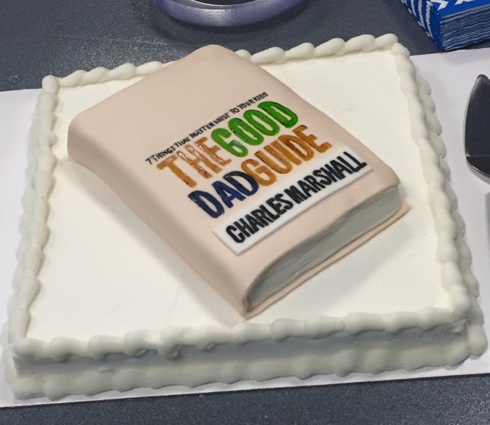 Custom book cake with printed title for author book signing event