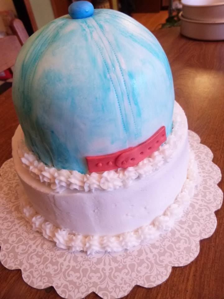 Sculpted baseball cap cake with realistic stitching detail designed by Atlanta cake artist Artful Cakery by Julie