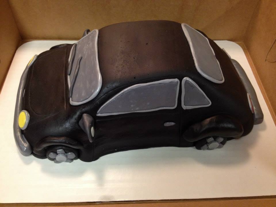 3D shaped black car cake