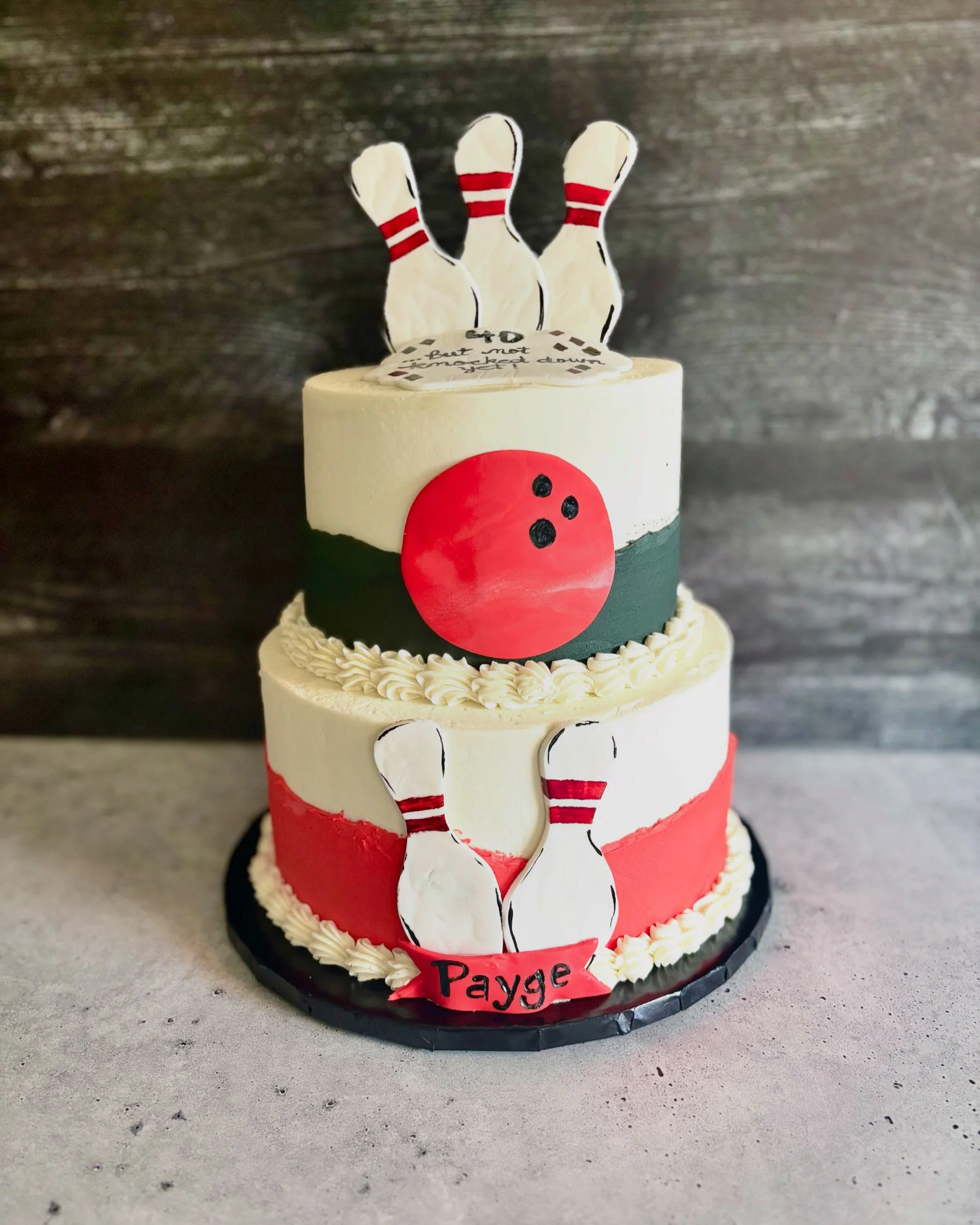 Bowling birthday cake with ball and pins for a bowling enthusiast.