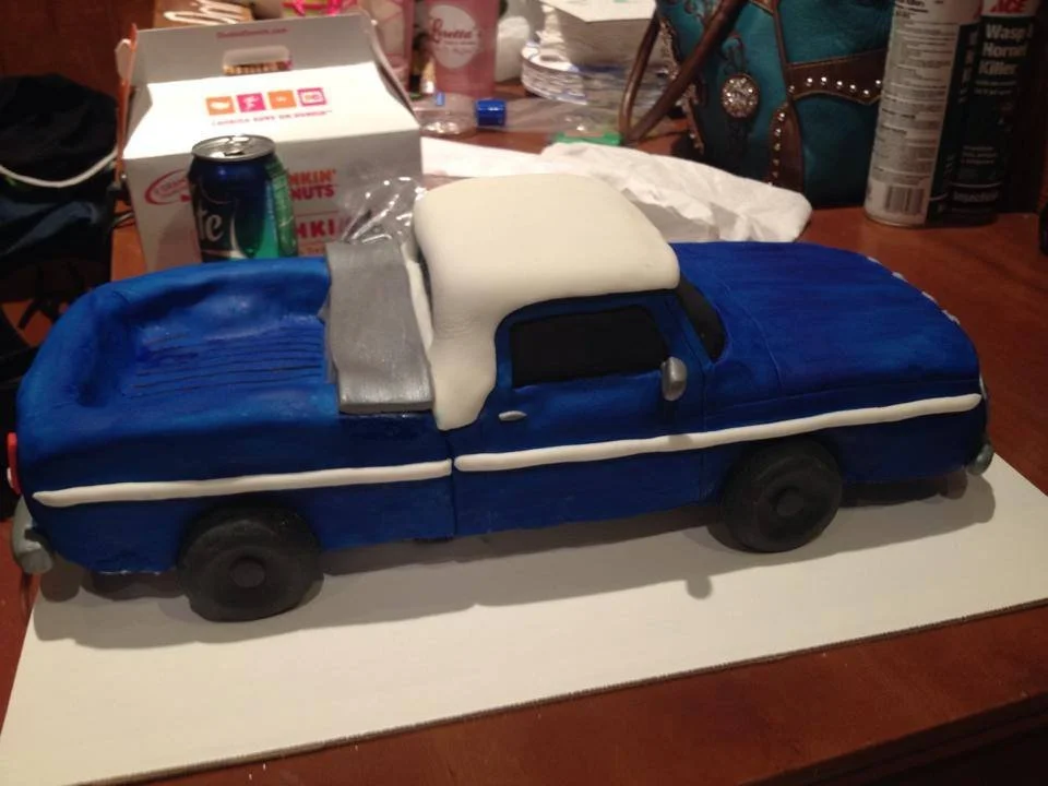 Vintage blue Ford truck sculpted cake for classic car lover