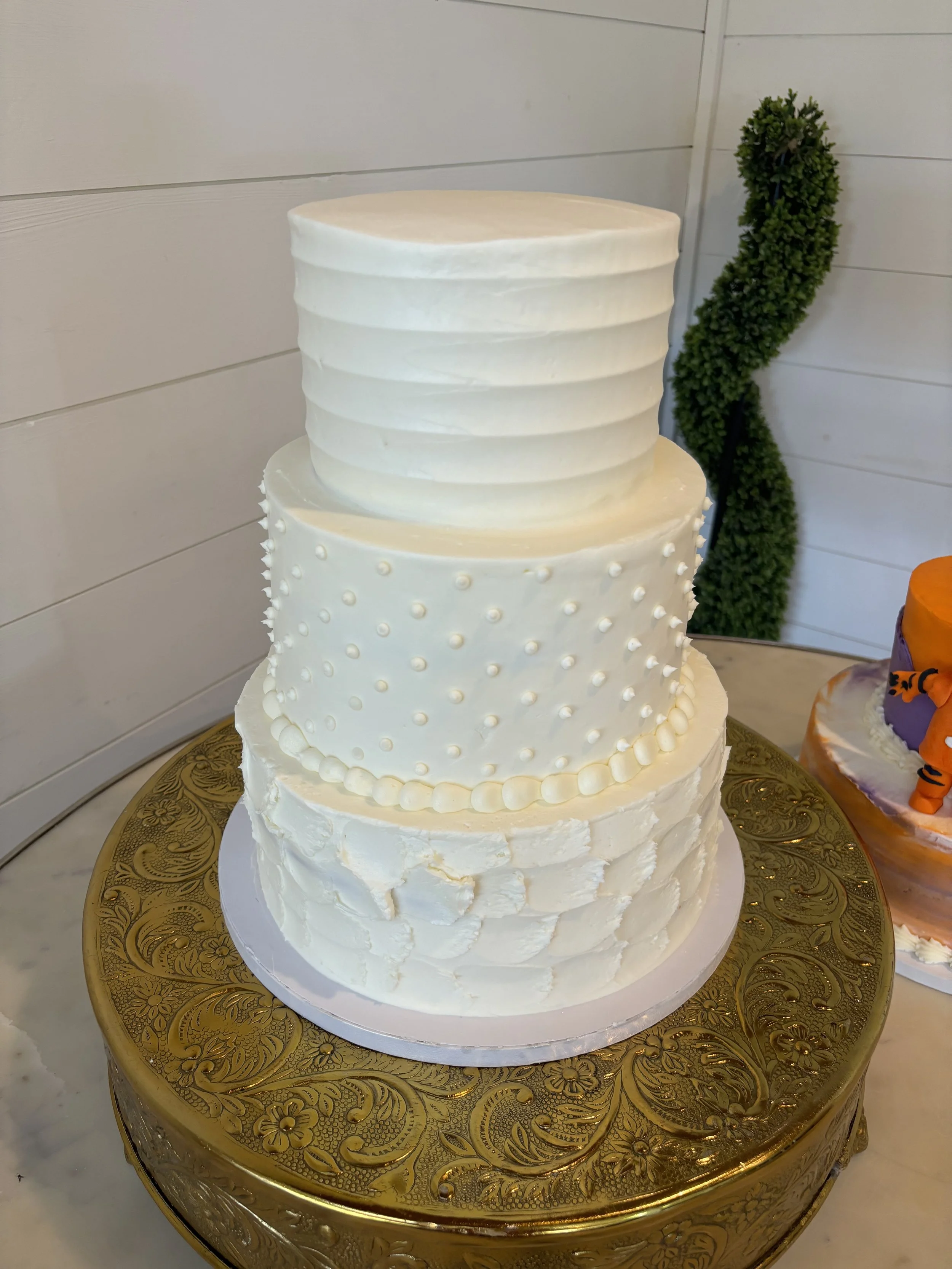 Three tiered textured buttercream wedding cake at Meadows at Mossy Creek in Cleveland, Georgia