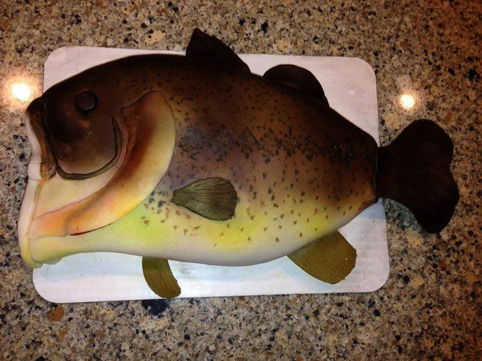 Realistic largemouth bass cake for fishing enthusiast birthday